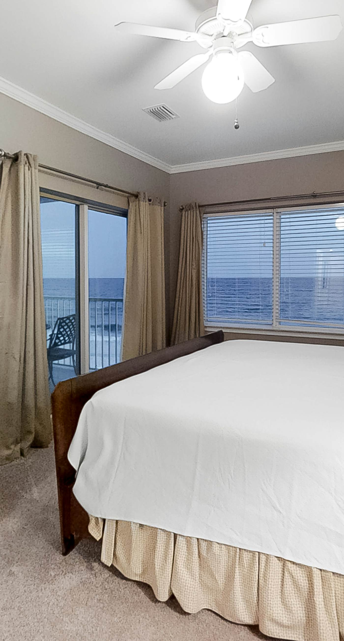 Gulf-Front condo with balcony, beach access, WiFi, AC, & outdoor pool