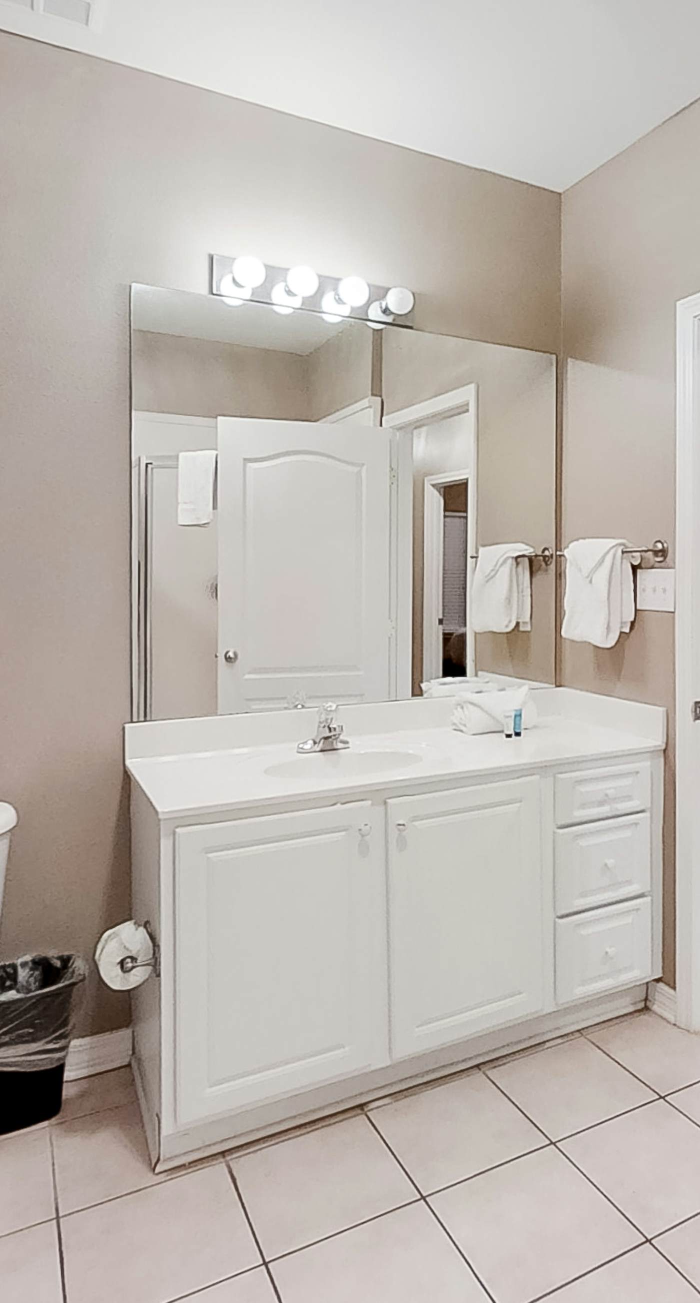 Gulf-Front condo with balcony, beach access, WiFi, AC, & outdoor pool