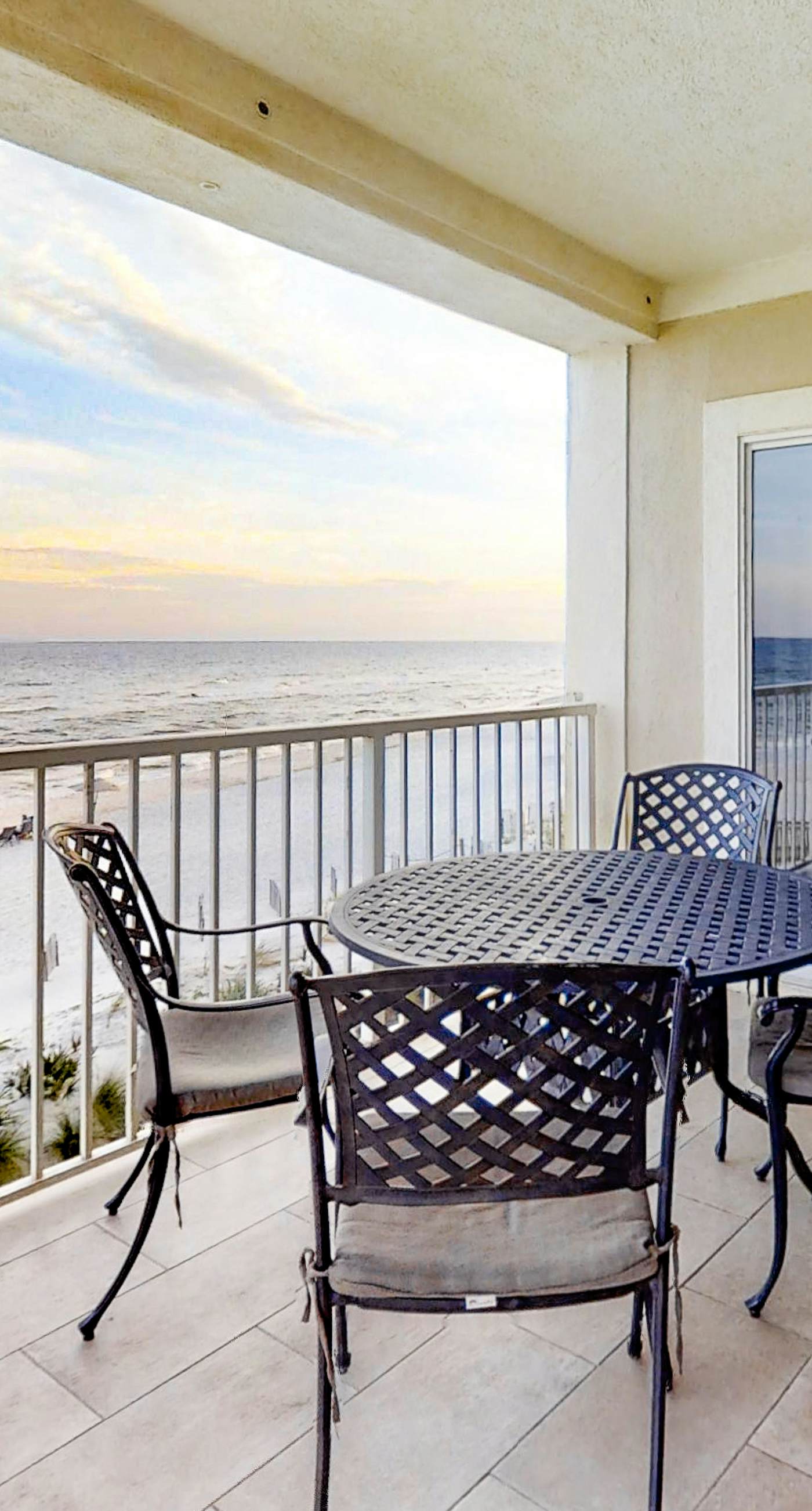 Gulf-Front condo with balcony, beach access, WiFi, AC, & outdoor pool