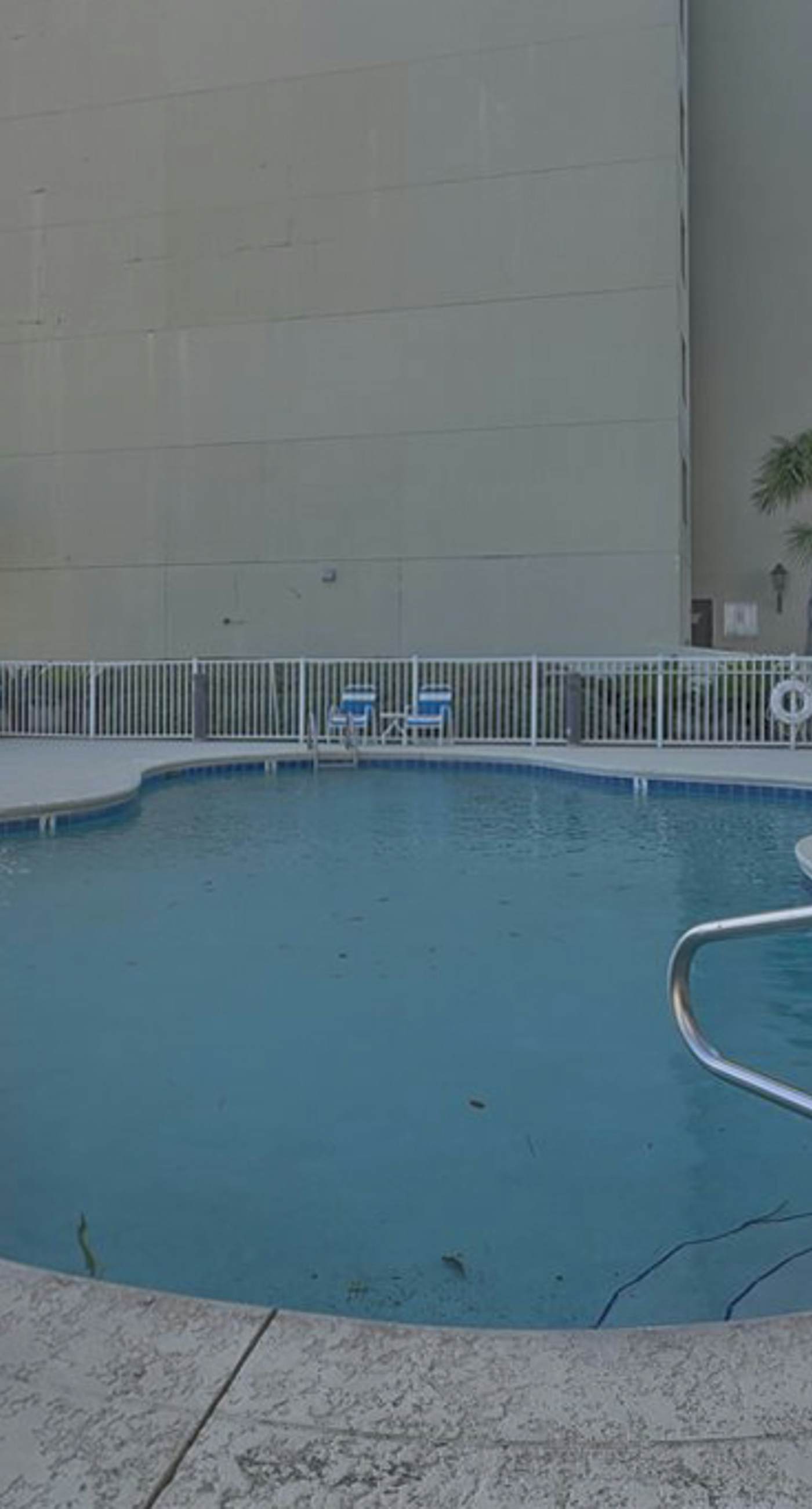 Gulf-Front condo with balcony, beach access, WiFi, AC, & outdoor pool