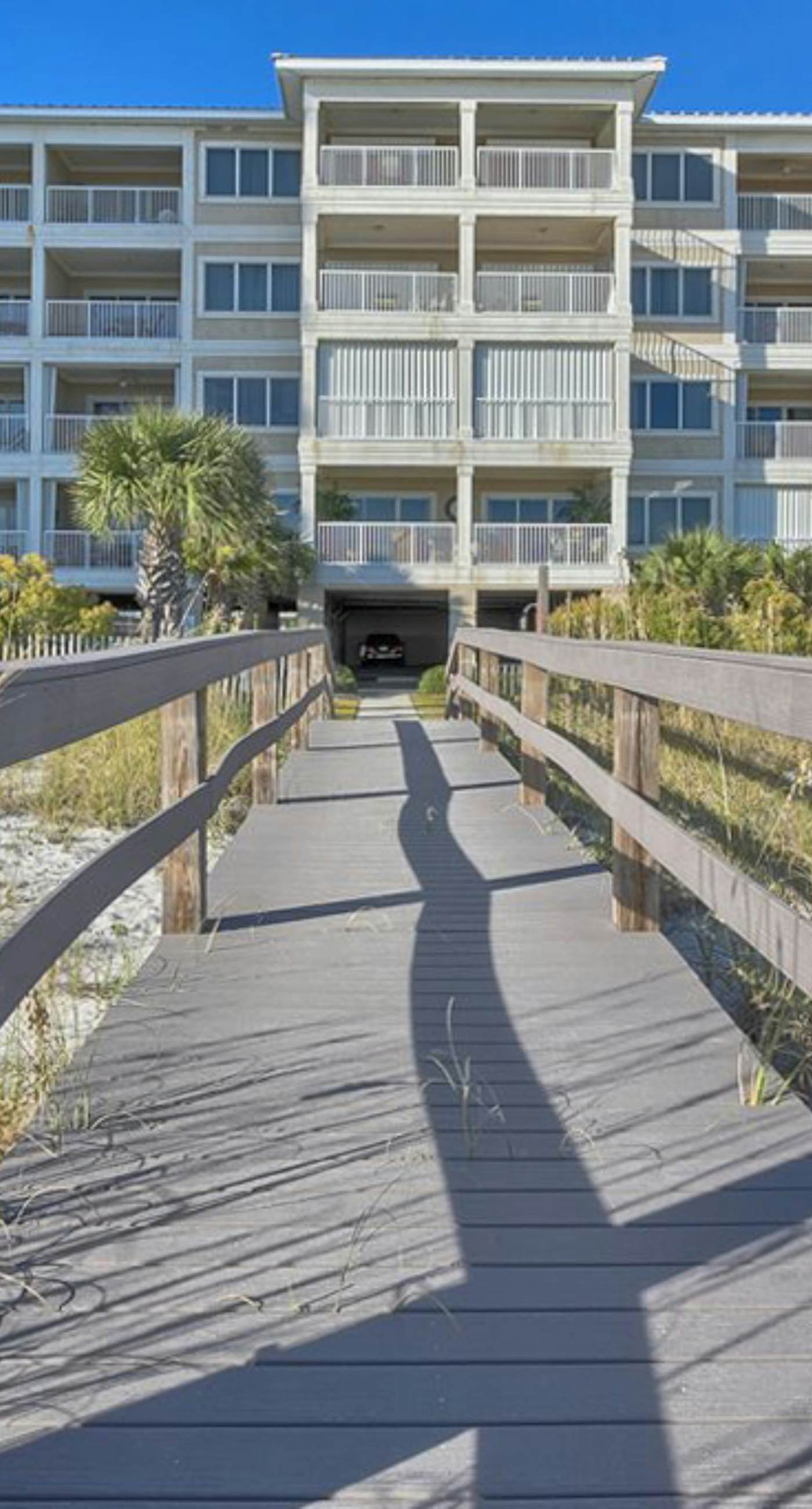 Gulf-Front condo with balcony, beach access, WiFi, AC, & outdoor pool