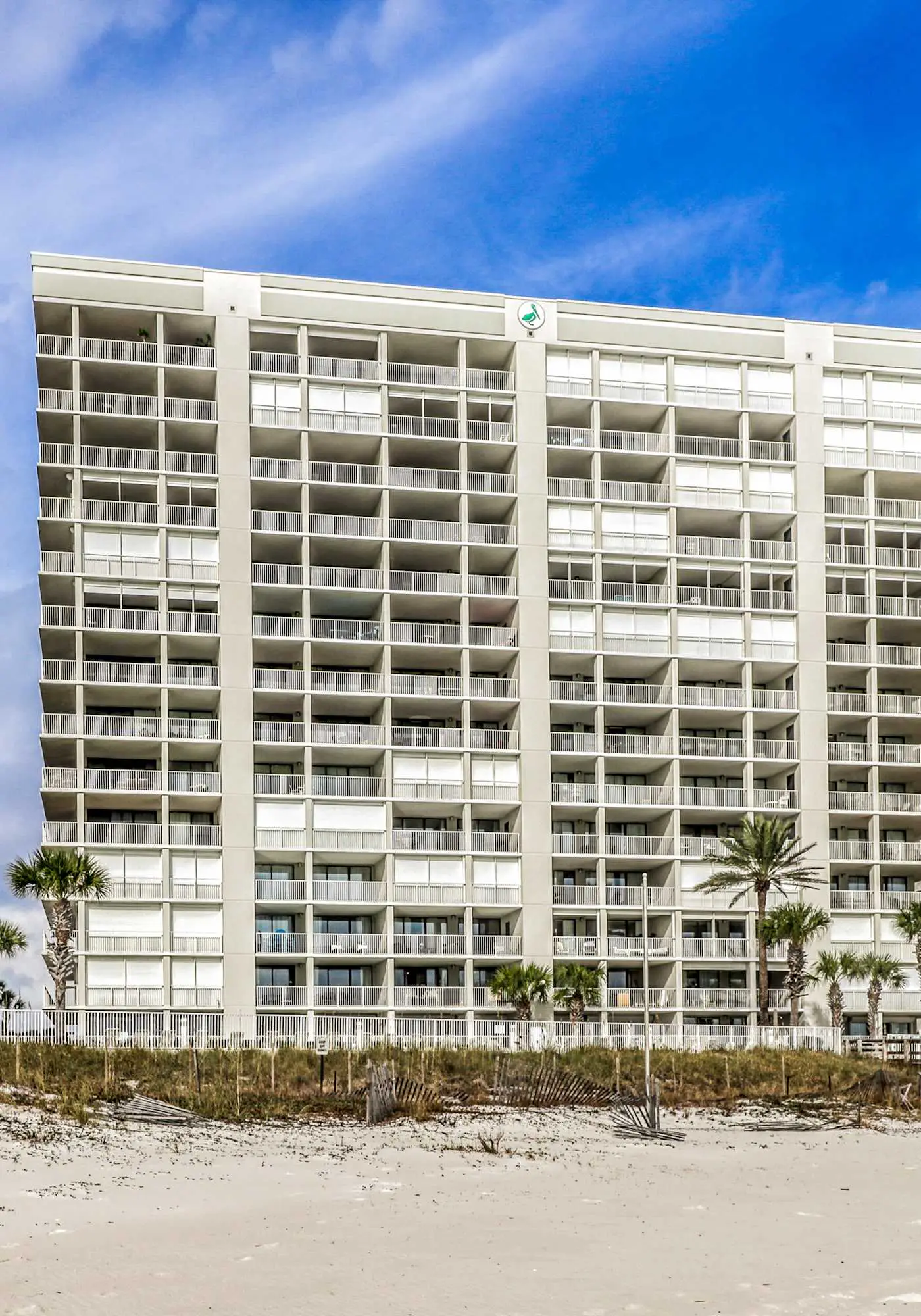 Garden-level, beachfront condo with patio, AC, pools, hot tub & tennis