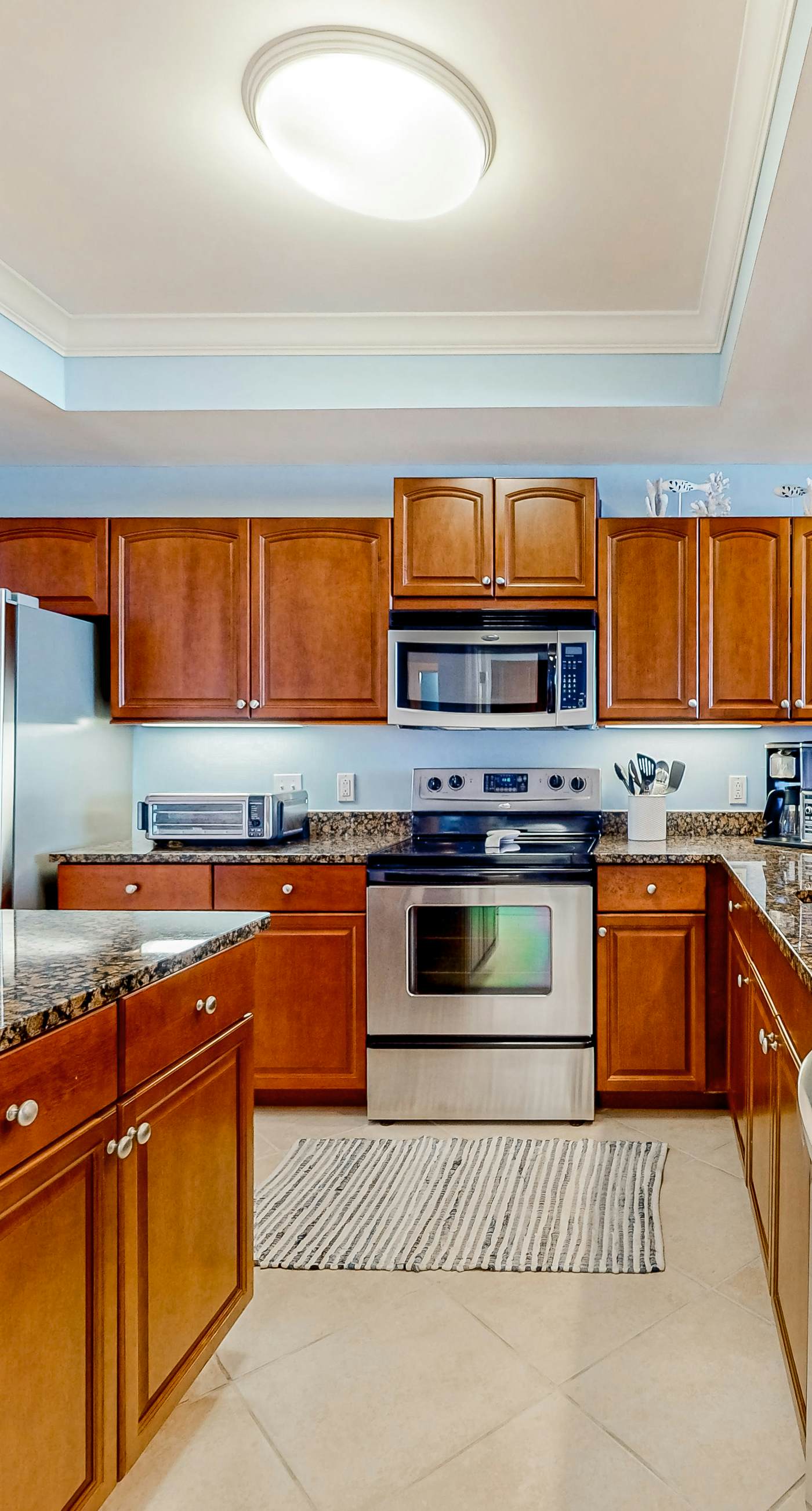 Gulf-front condo with a beach view, pools, hot tub, tennis, & fitness room