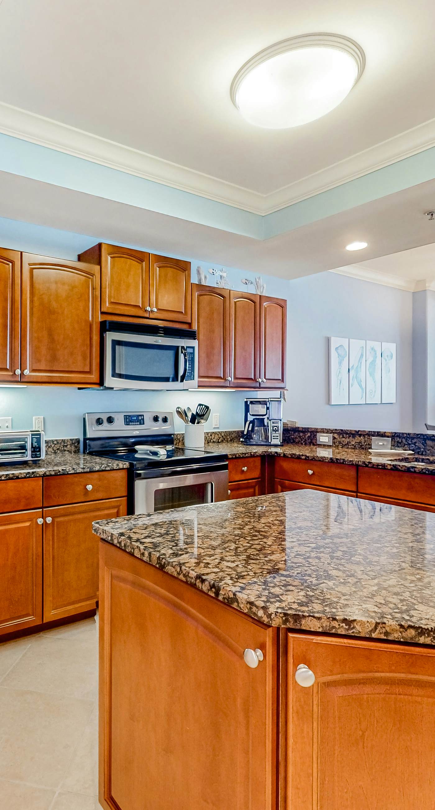 Gulf-front condo with a beach view, pools, hot tub, tennis, & fitness room