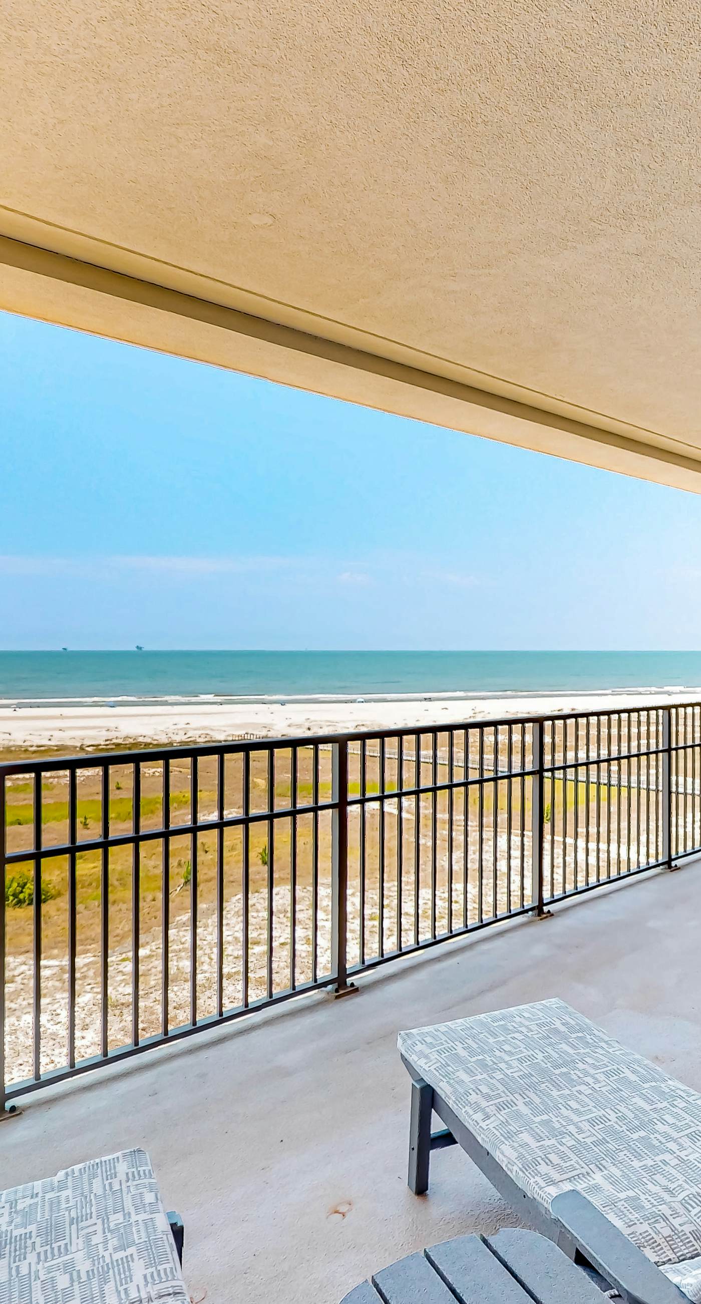 Gulf-front condo with a beach view, pools, hot tub, tennis, & fitness room