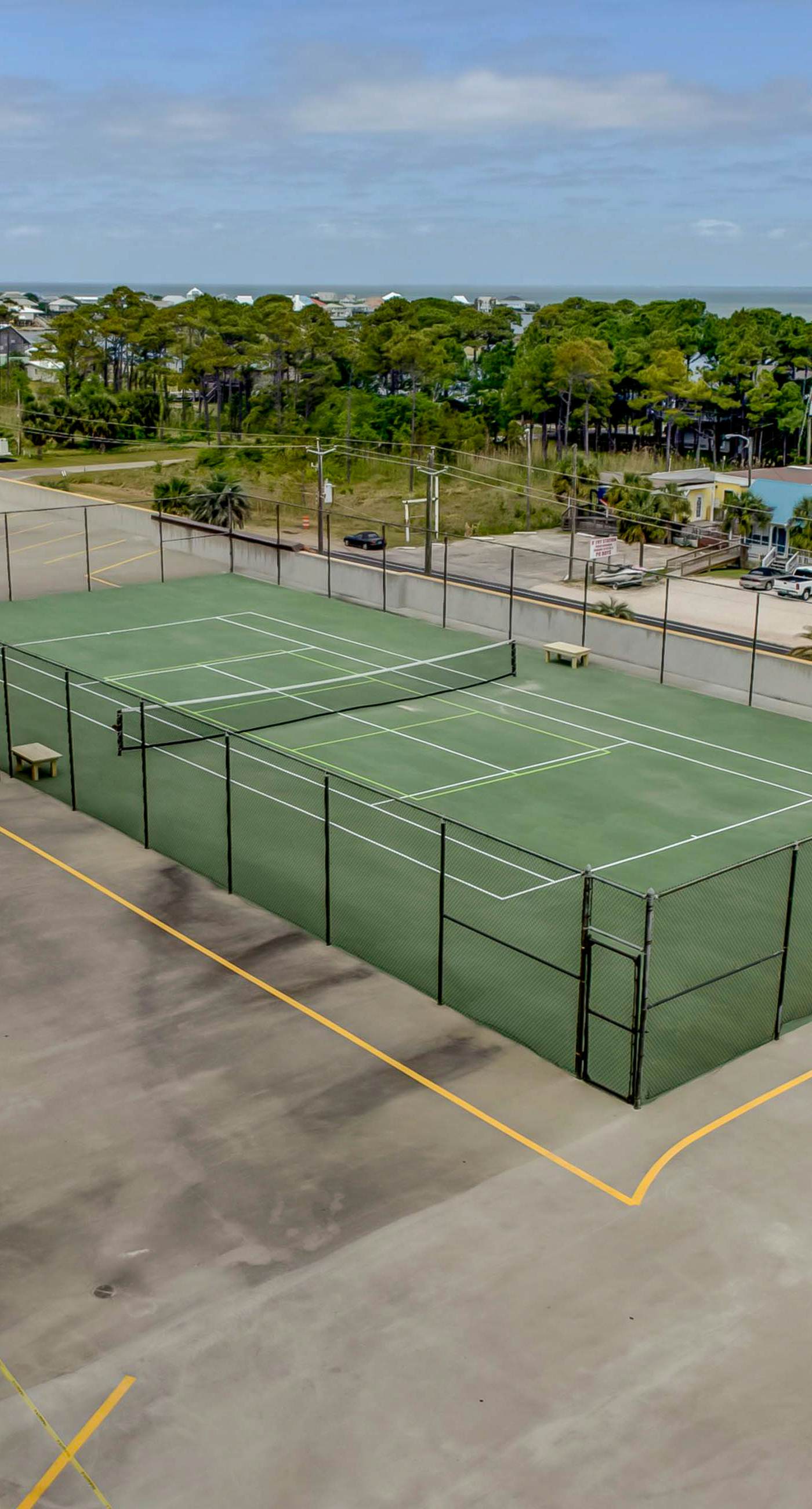 Gulf-front condo with a beach view, pools, hot tub, tennis, & fitness room