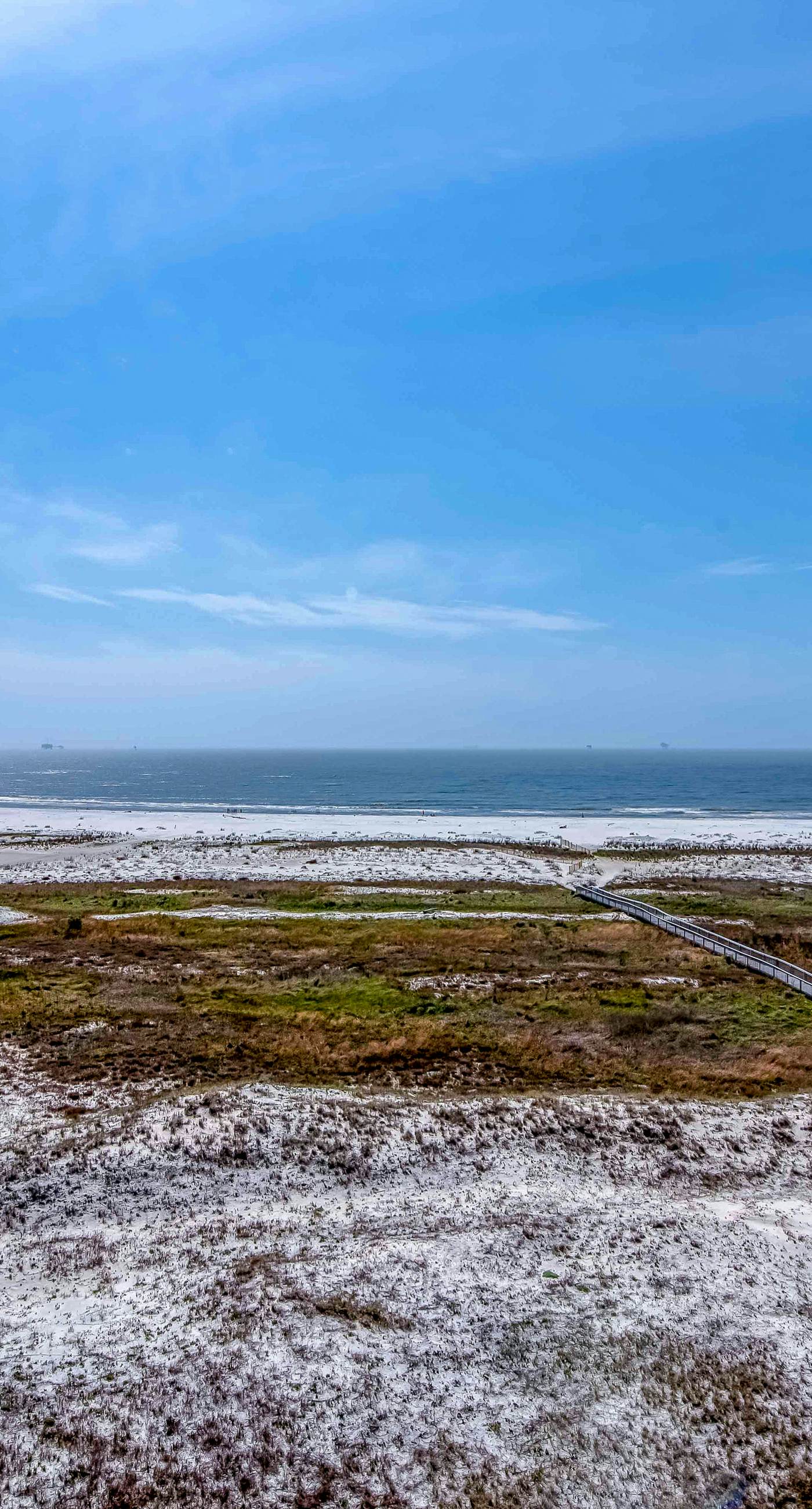 Gulf-front condo with a beach view, pools, hot tub, tennis, & fitness room