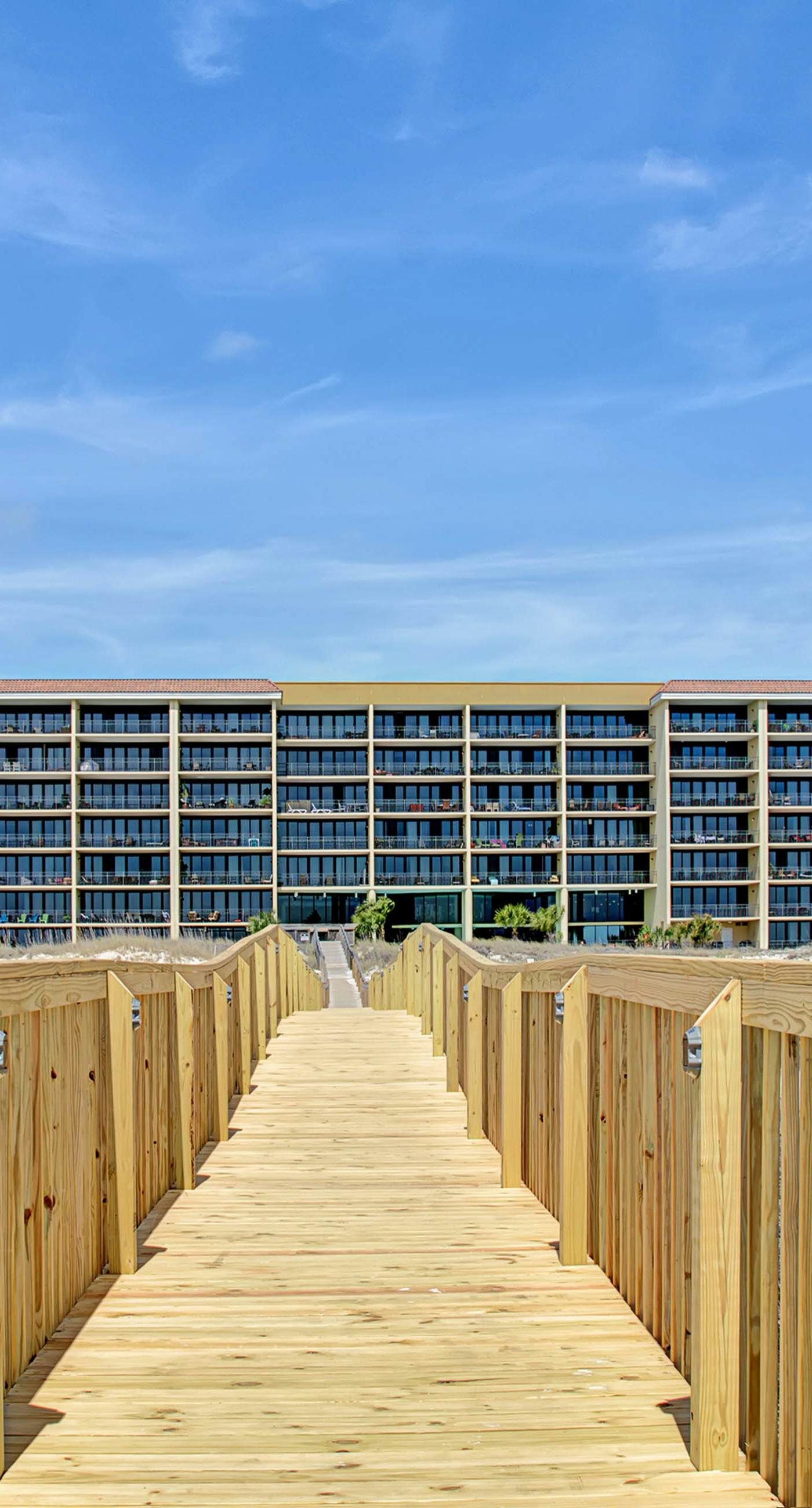 Gulf-front condo with a beach view, pools, hot tub, tennis, & fitness room