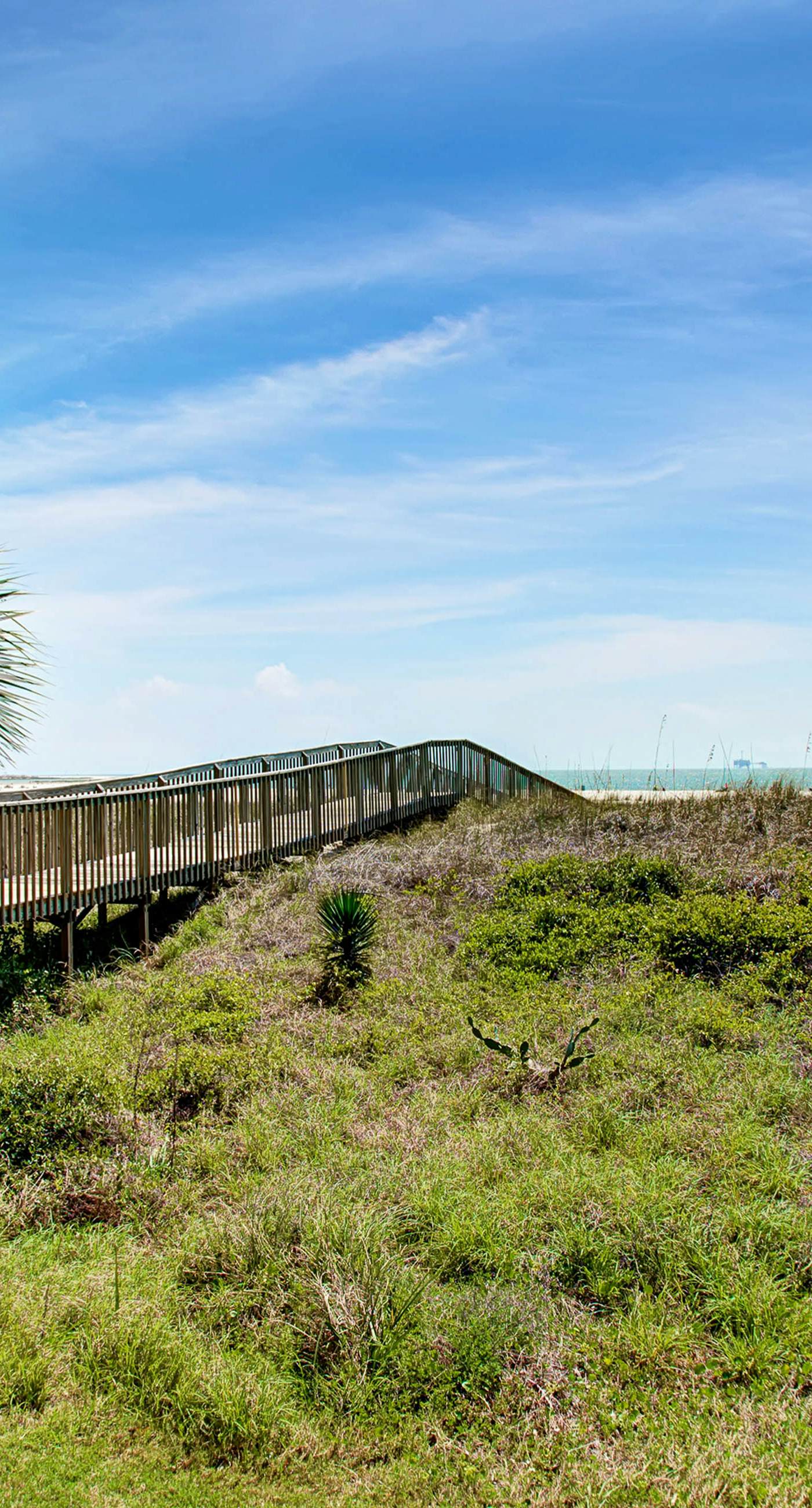Gulf-front condo with a beach view, pools, hot tub, tennis, & fitness room