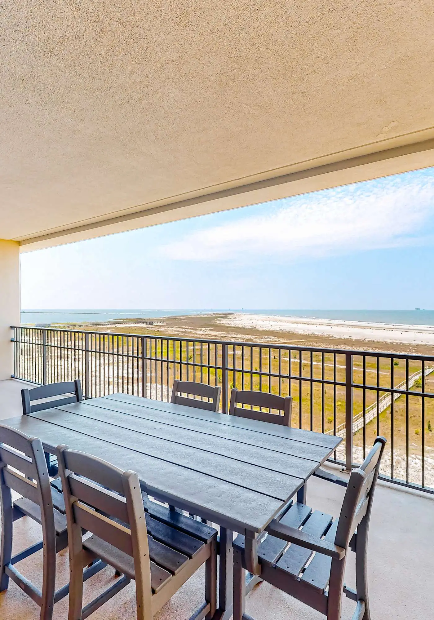 Gulf-front condo with a beach view, pools, hot tub, tennis, & fitness room