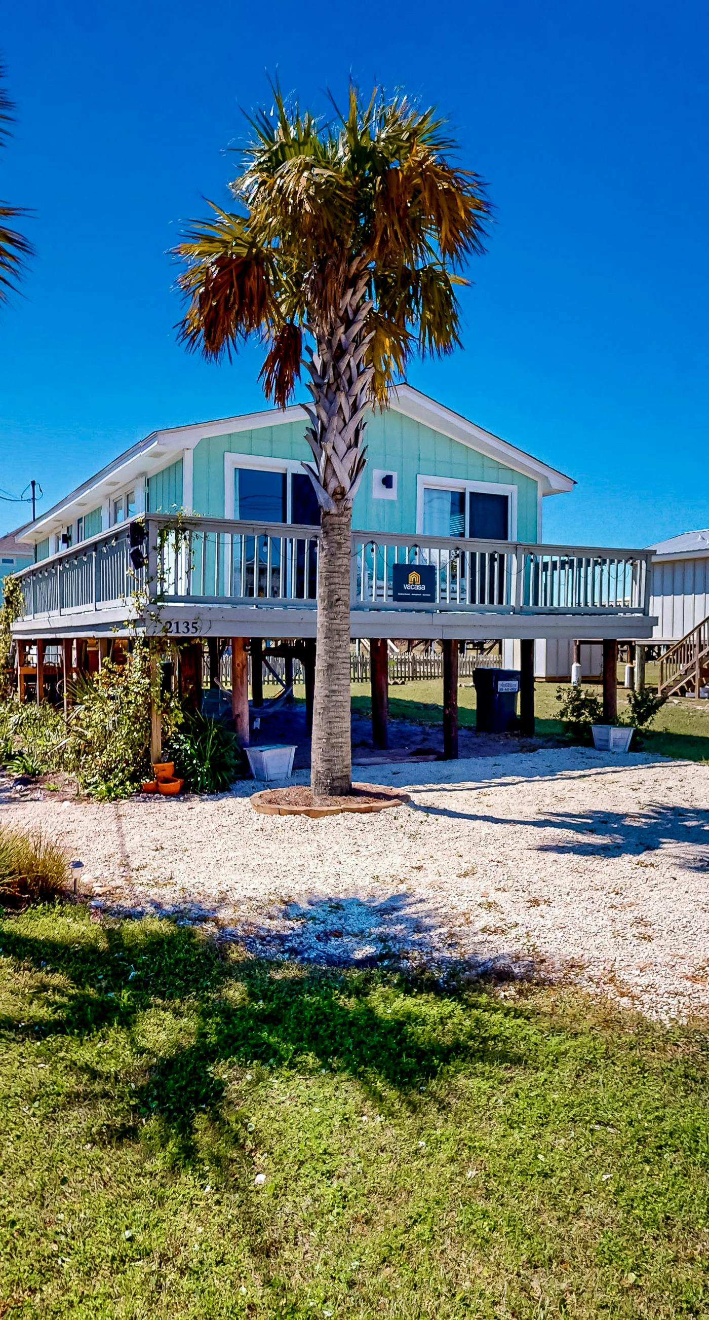 Gulf-view house with balcony, central AC, high-speed WiFi, full kitchen, & W&D