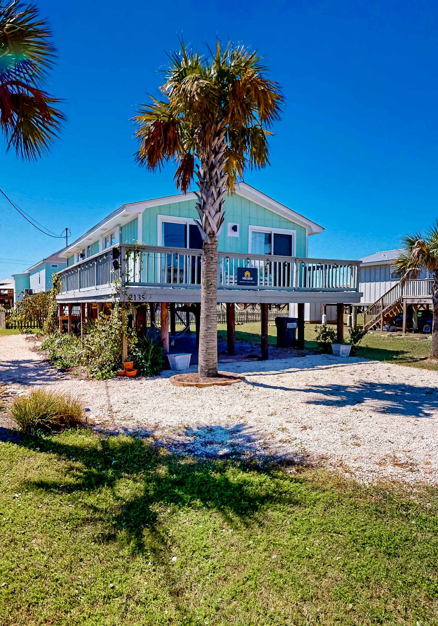 Gulf-view house with balcony, central AC, high-speed WiFi, full kitchen, & W&D