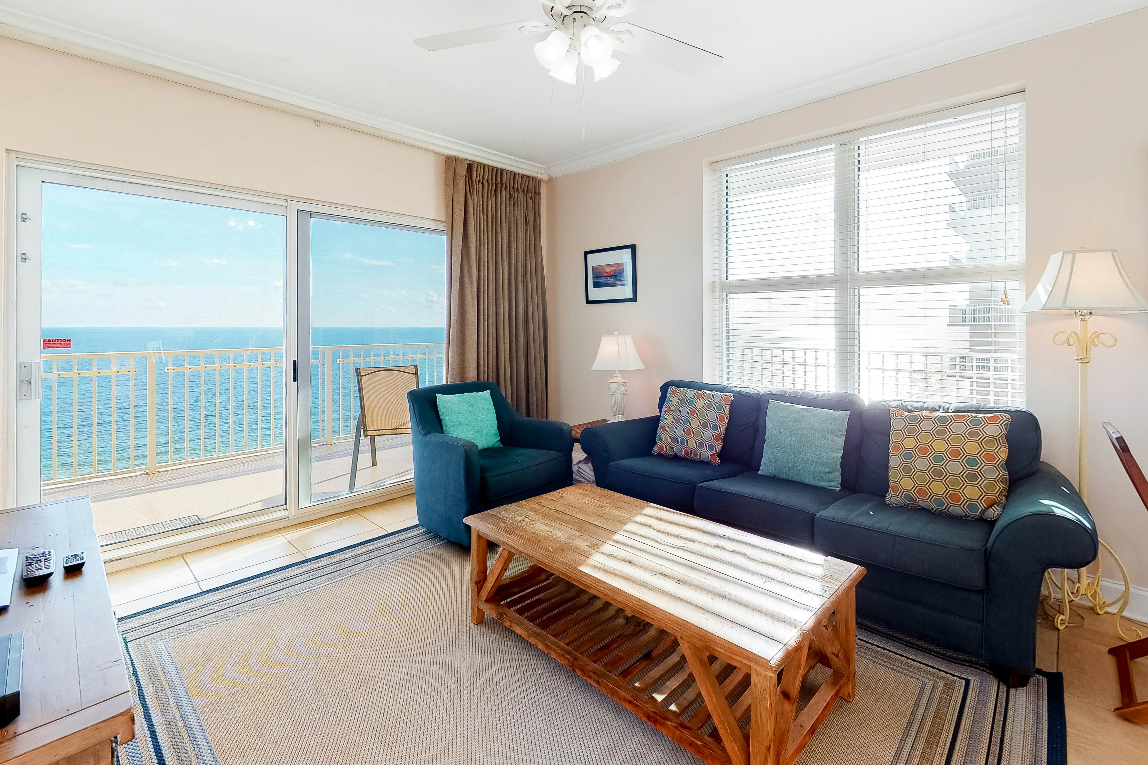 Beachfront condo with pool, hot tub, and sauna access - private balcony
