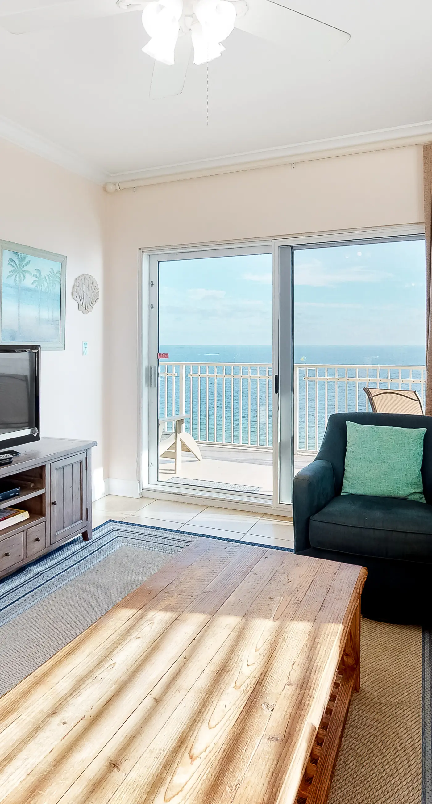 Beachfront condo with pool, hot tub, and sauna access - private balcony