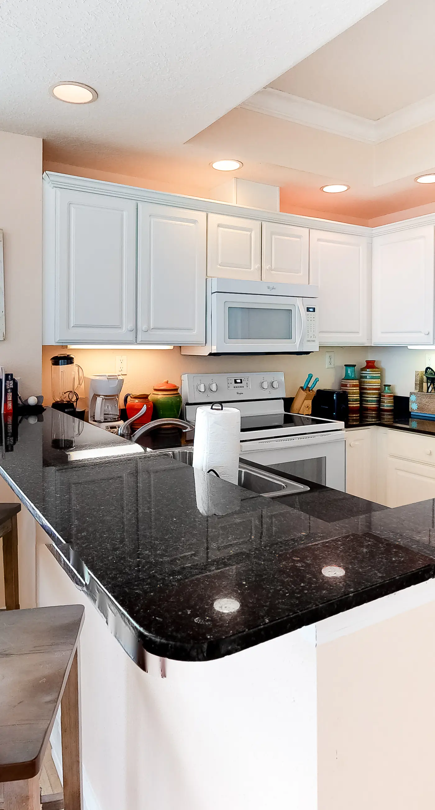 Beachfront condo with pool, hot tub, and sauna access - private balcony