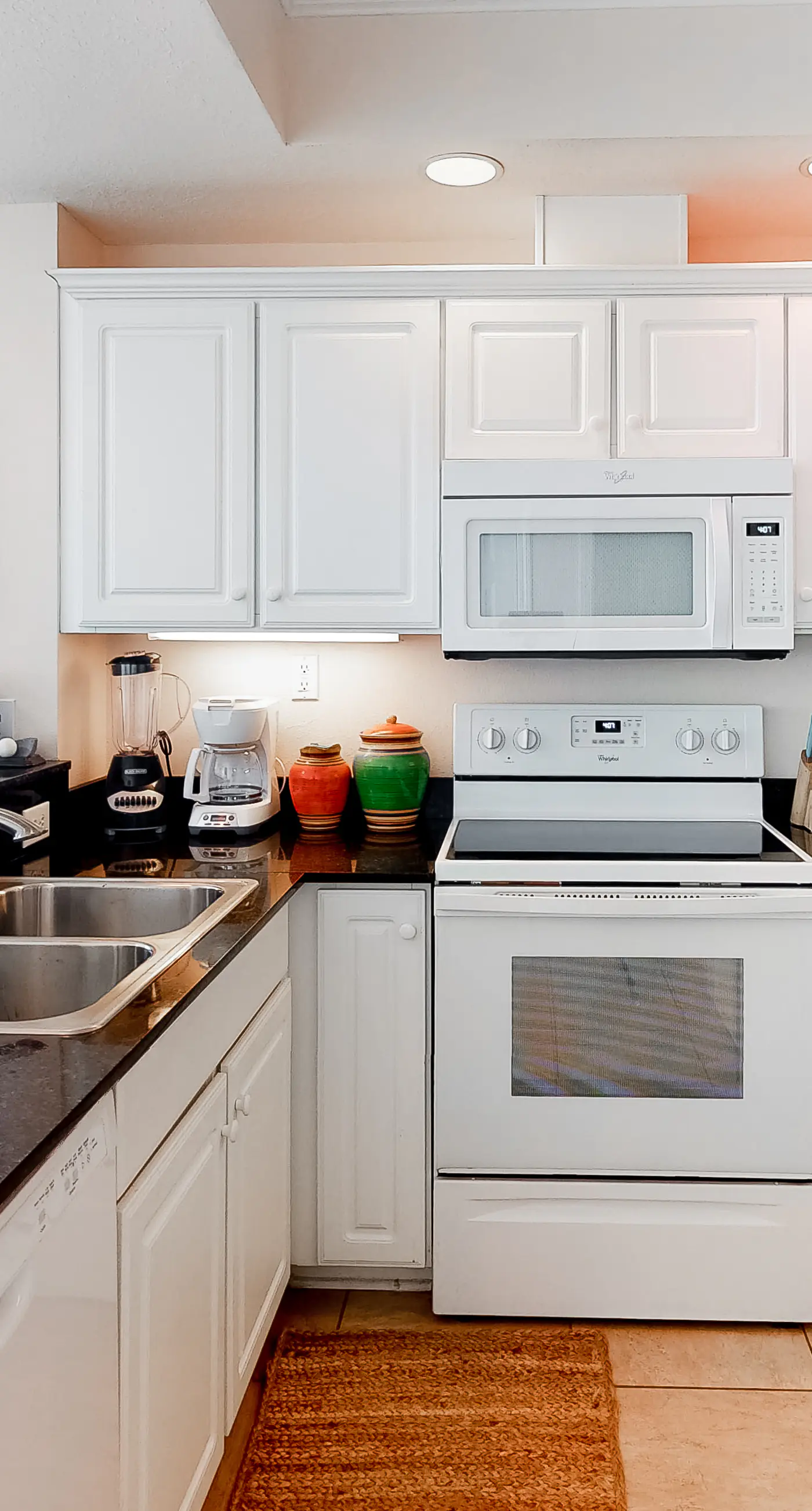 Beachfront condo with pool, hot tub, and sauna access - private balcony