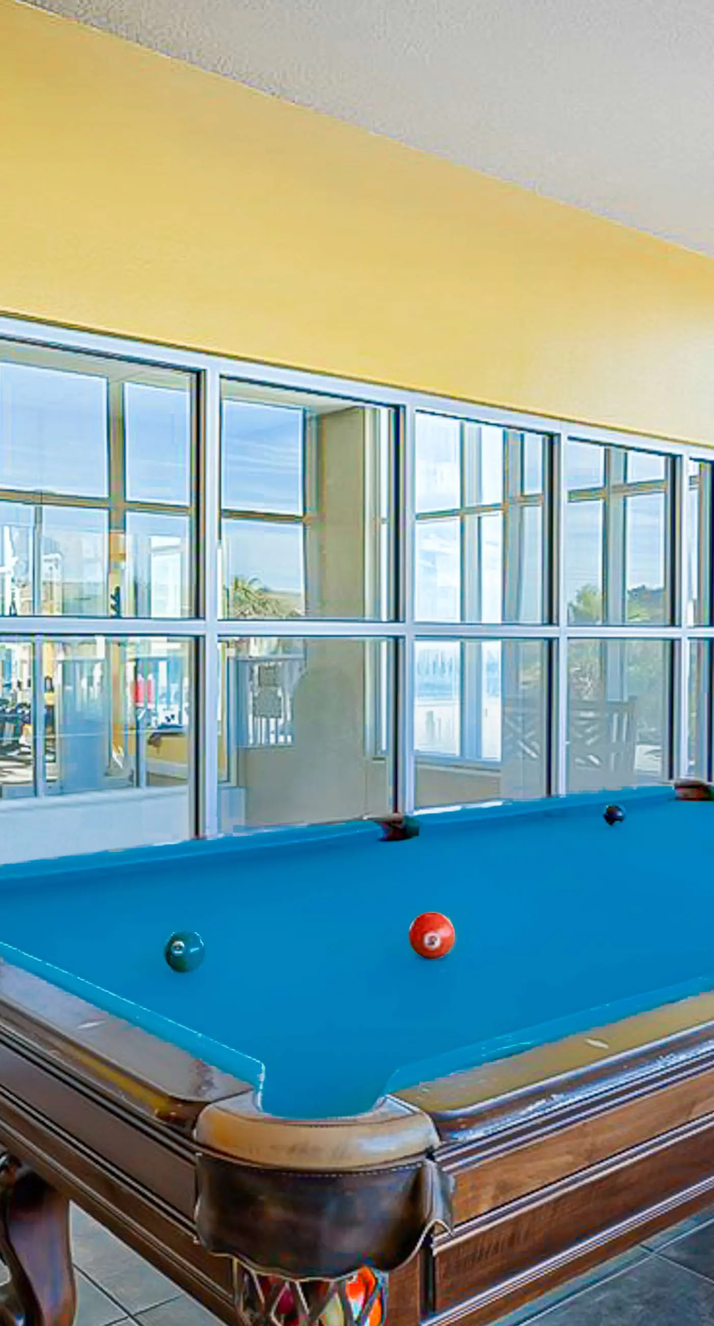 Beachfront condo with pool, hot tub, and sauna access - private balcony