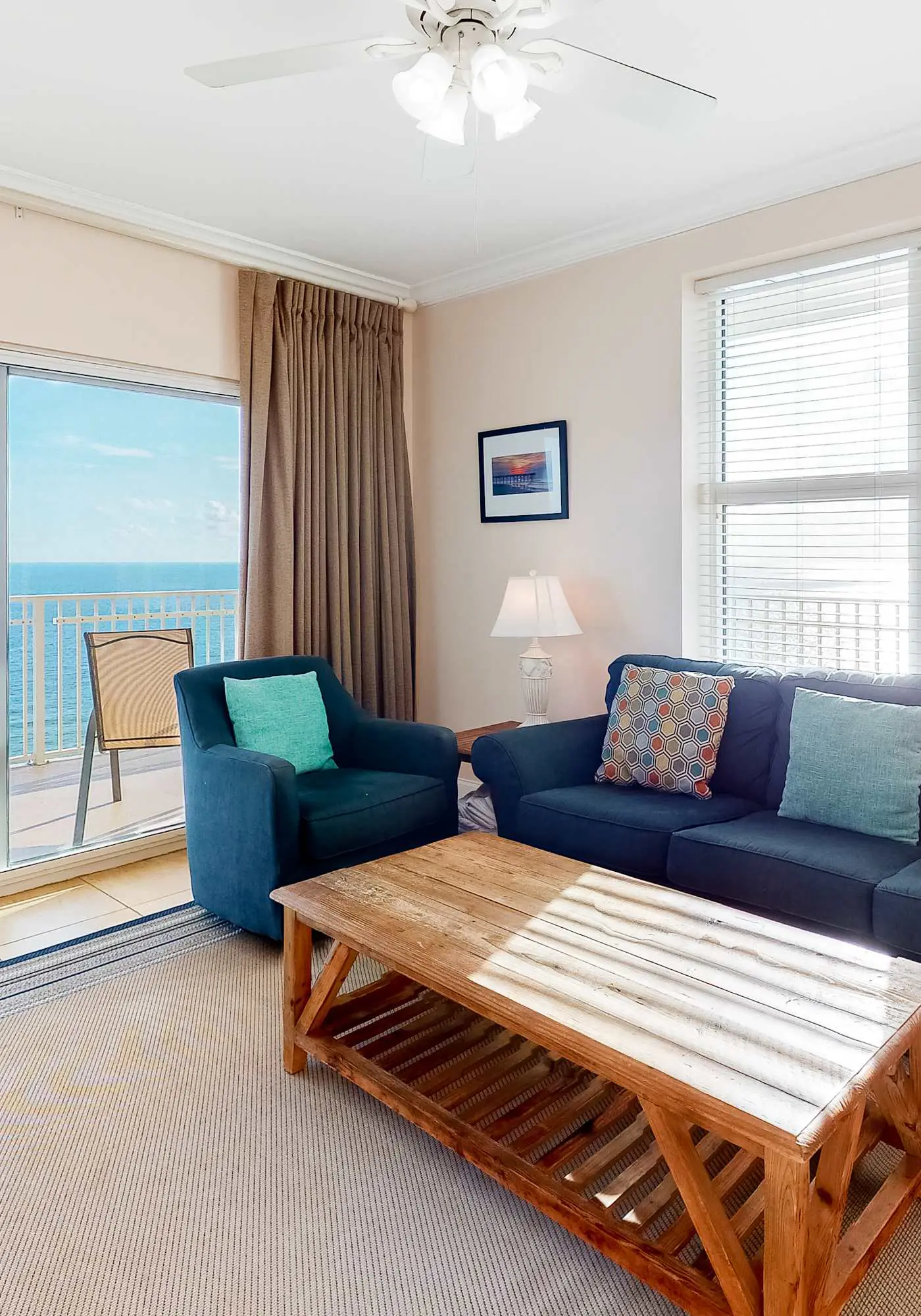 Beachfront condo with pool, hot tub, and sauna access - private balcony