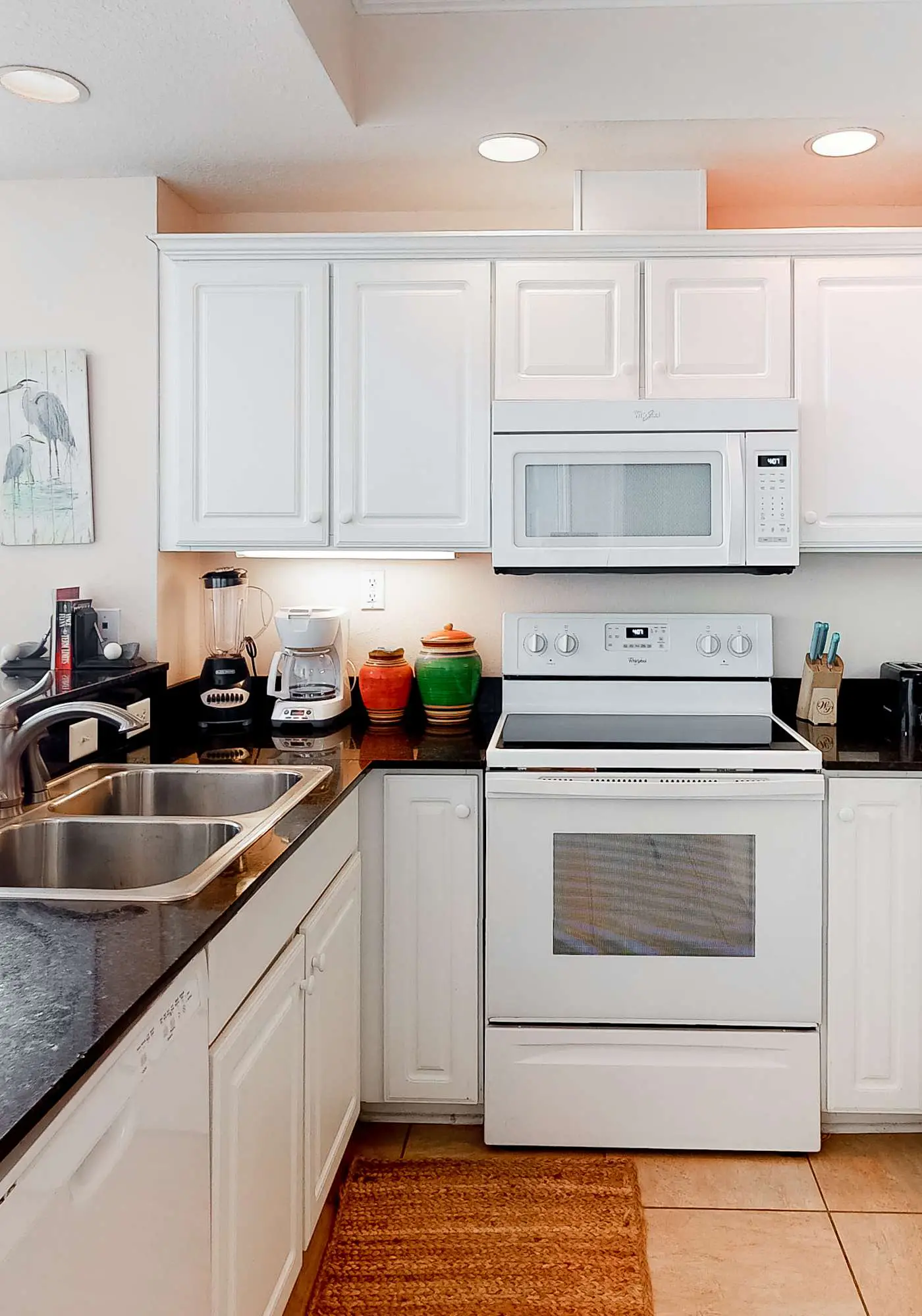 Beachfront condo with pool, hot tub, and sauna access - private balcony