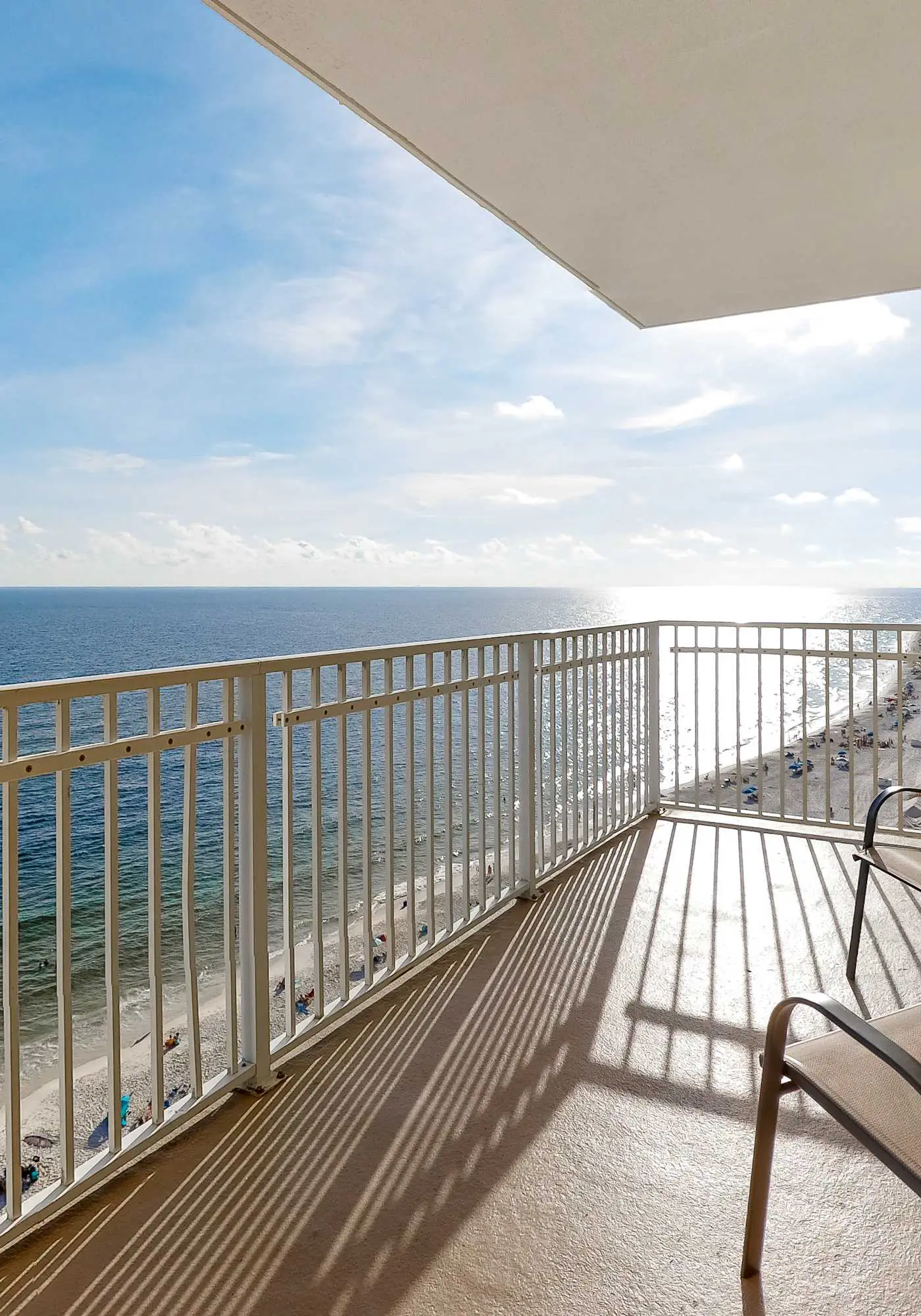 Beachfront condo with pool, hot tub, and sauna access - private balcony