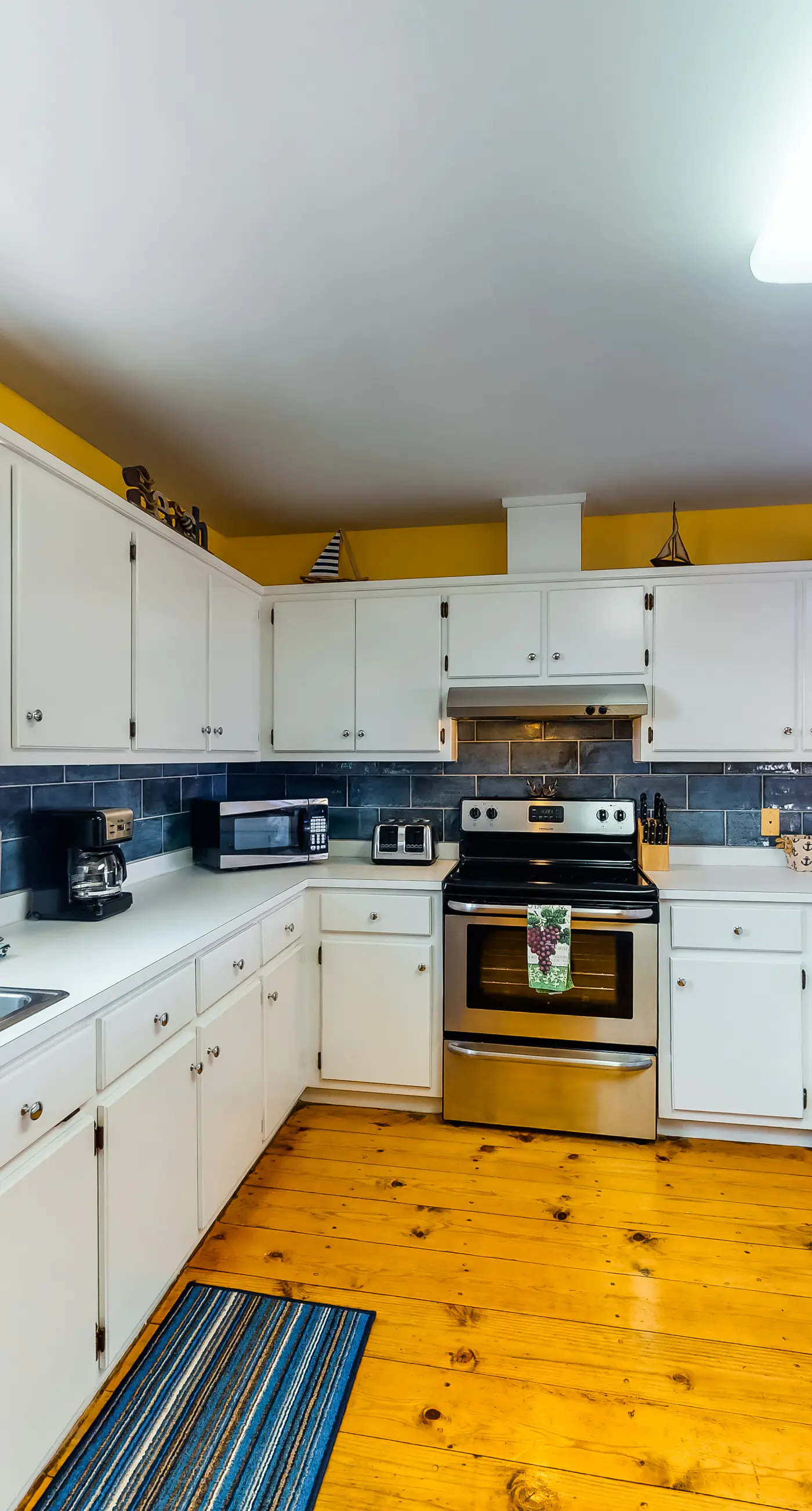 Dog-friendly, water view beach house with a full kitchen, furnished deck, private