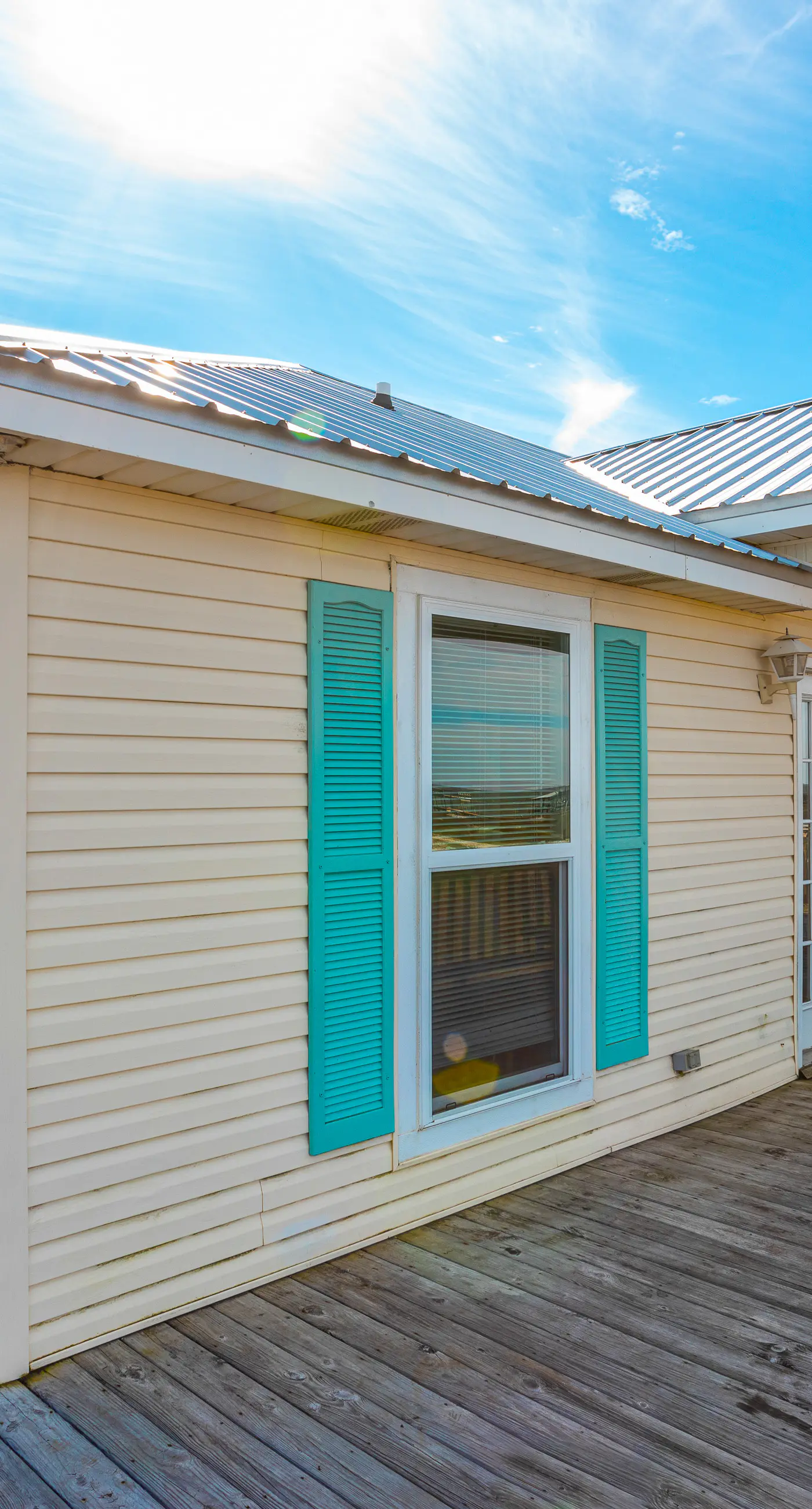 Dog-friendly, water view beach house with a full kitchen, furnished deck, private