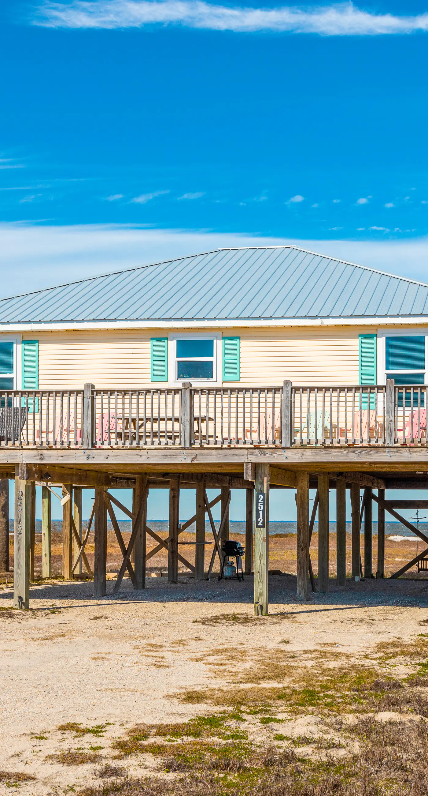 Dog-friendly, water view beach house with a full kitchen, furnished deck, private
