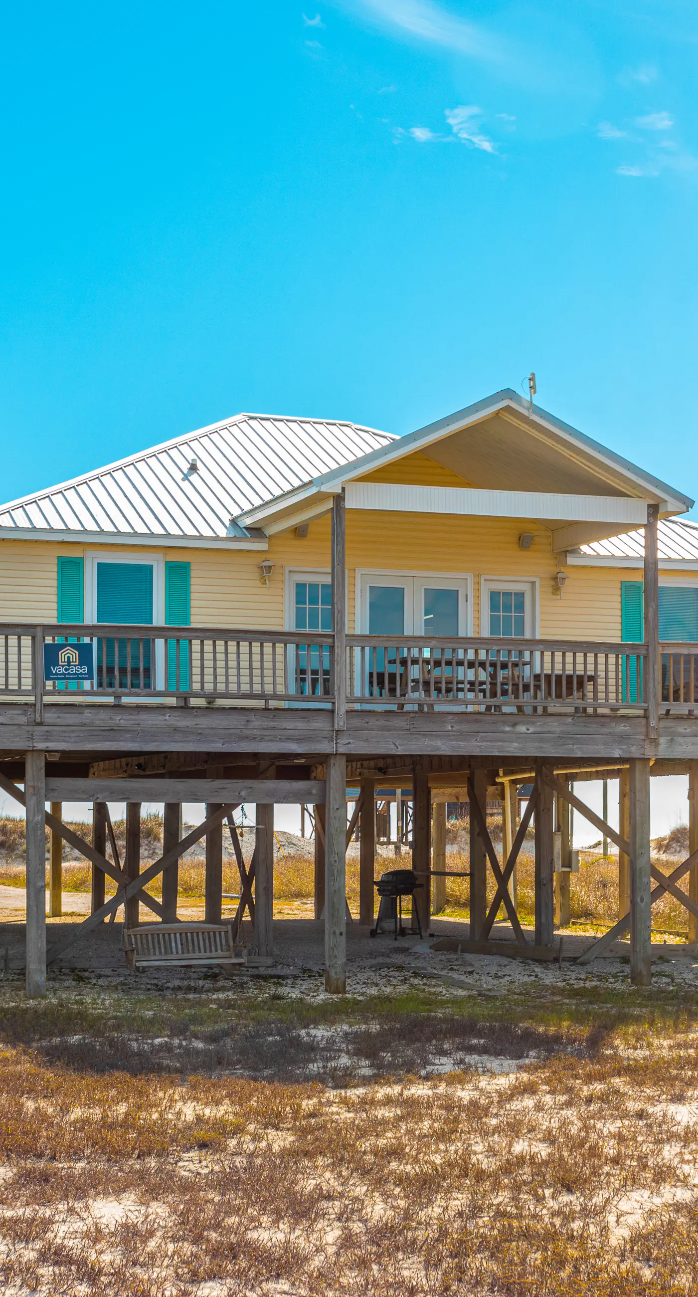 Dog-friendly, water view beach house with a full kitchen, furnished deck, private