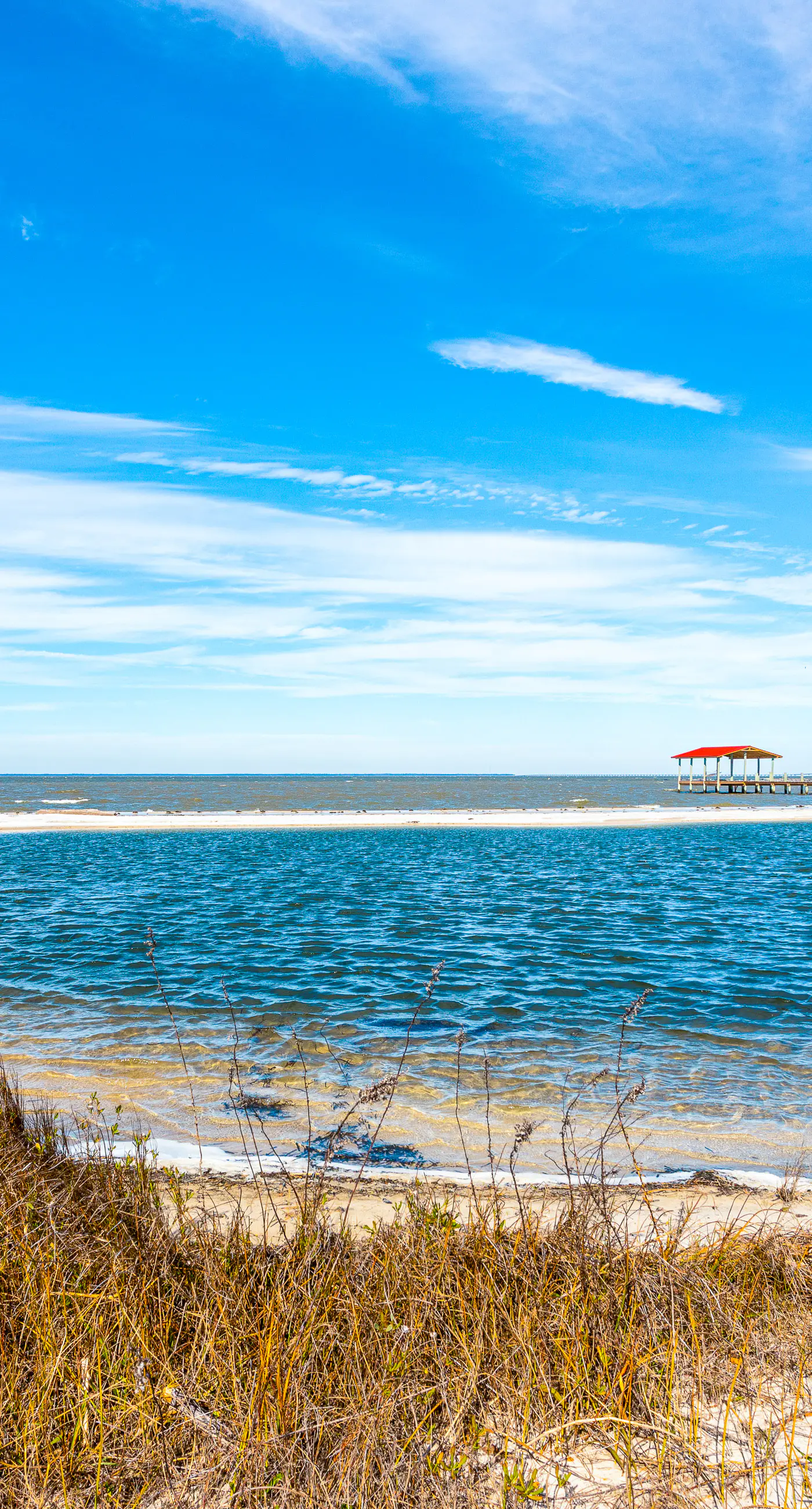 Dog-friendly, water view beach house with a full kitchen, furnished deck, private