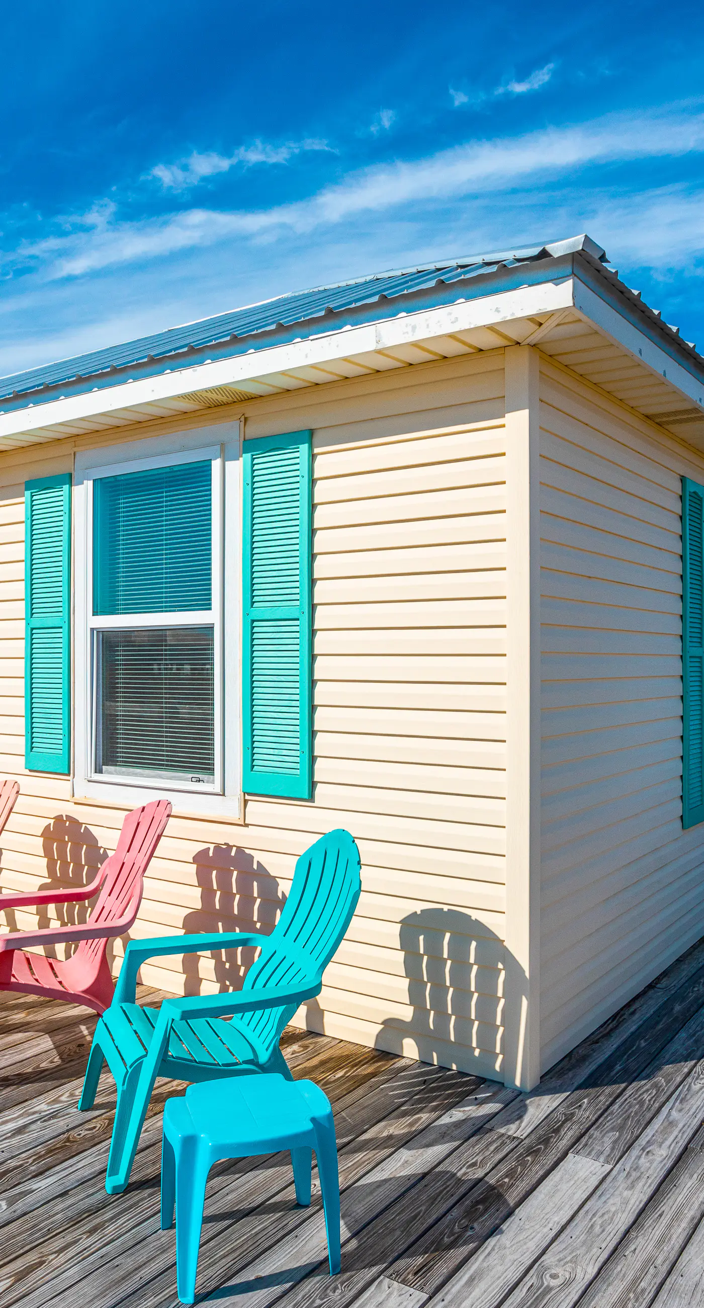 Dog-friendly, water view beach house with a full kitchen, furnished deck, private