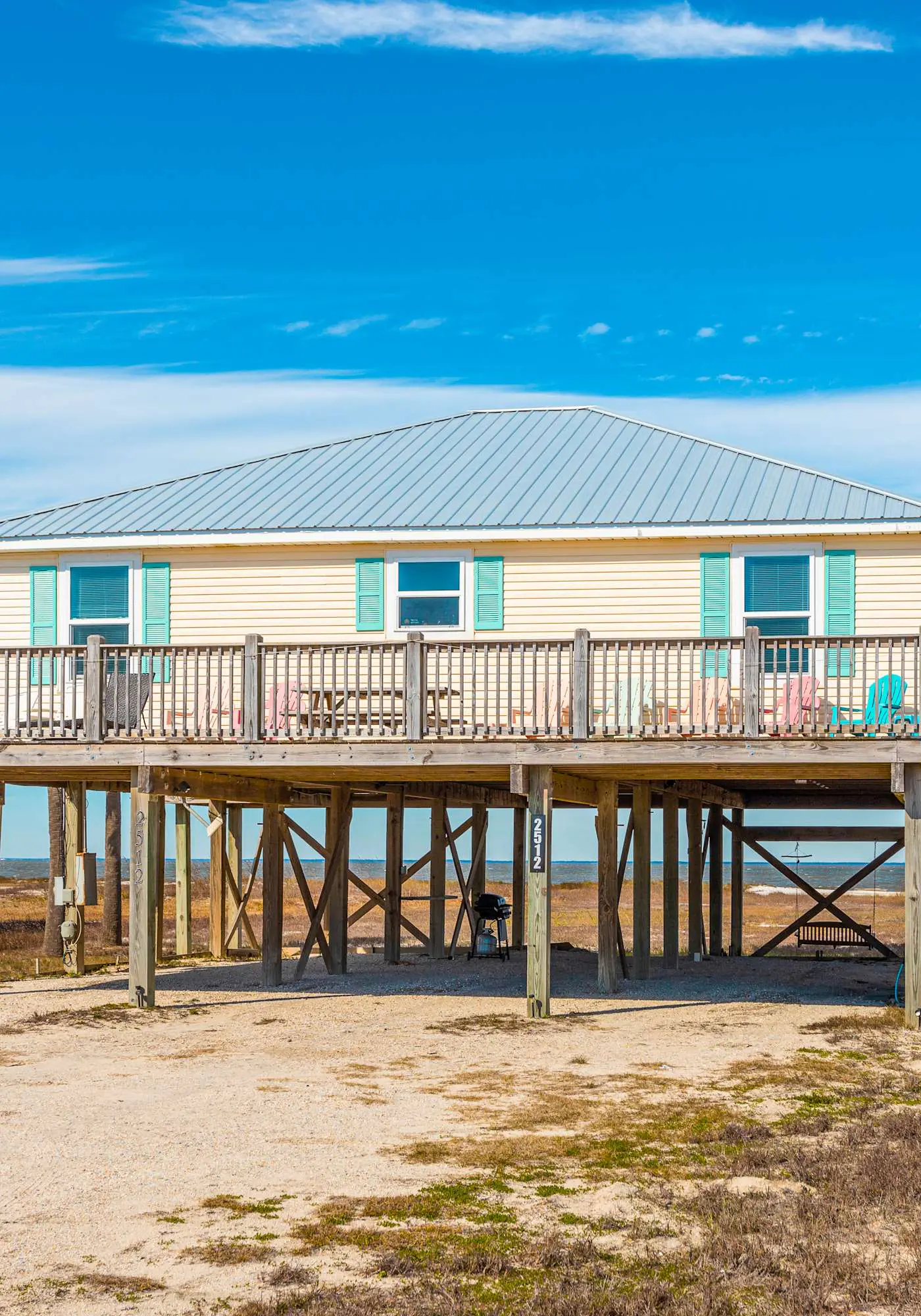 Dog-friendly, water view beach house with a full kitchen, furnished deck, private