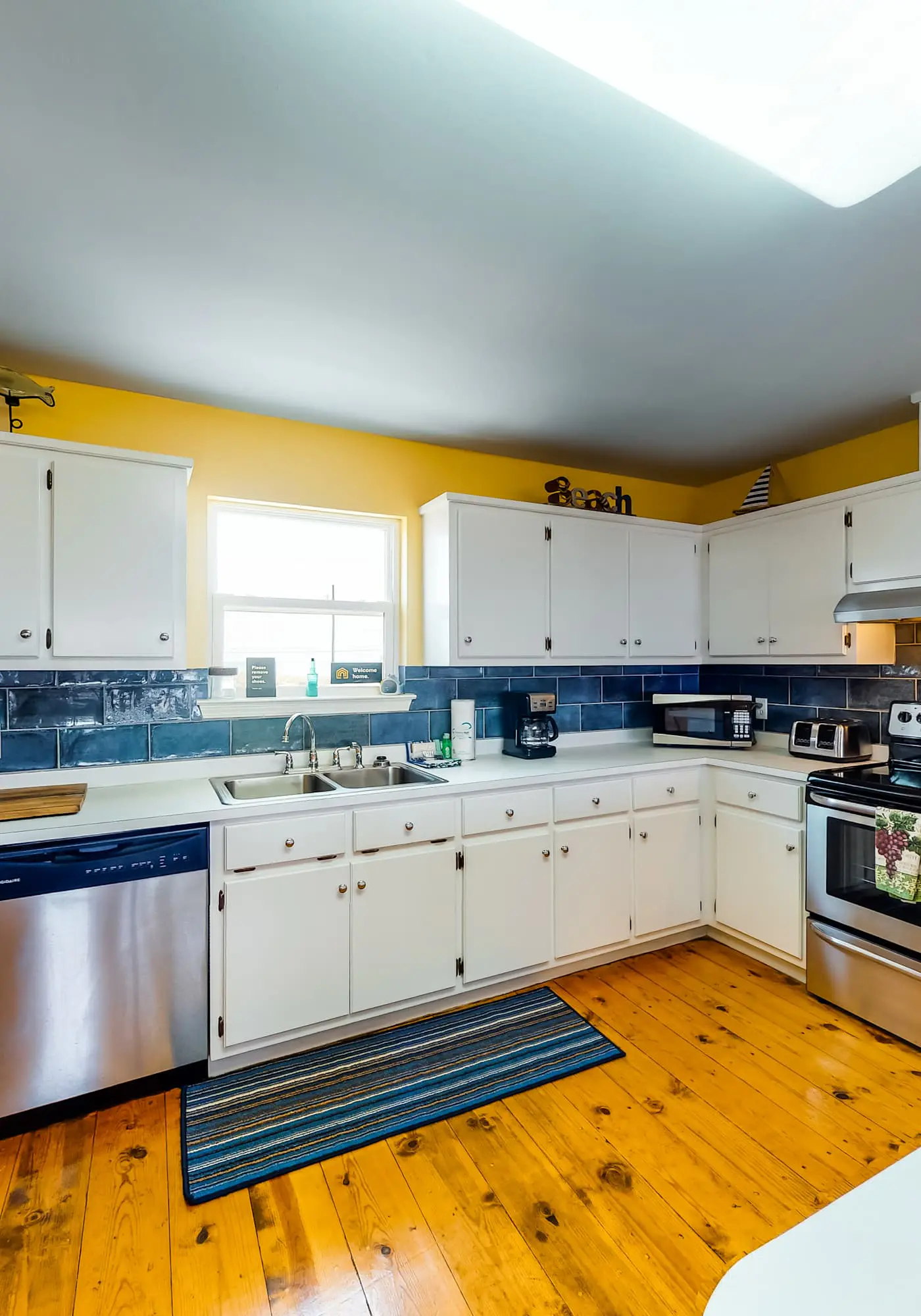 Dog-friendly, water view beach house with a full kitchen, furnished deck, private