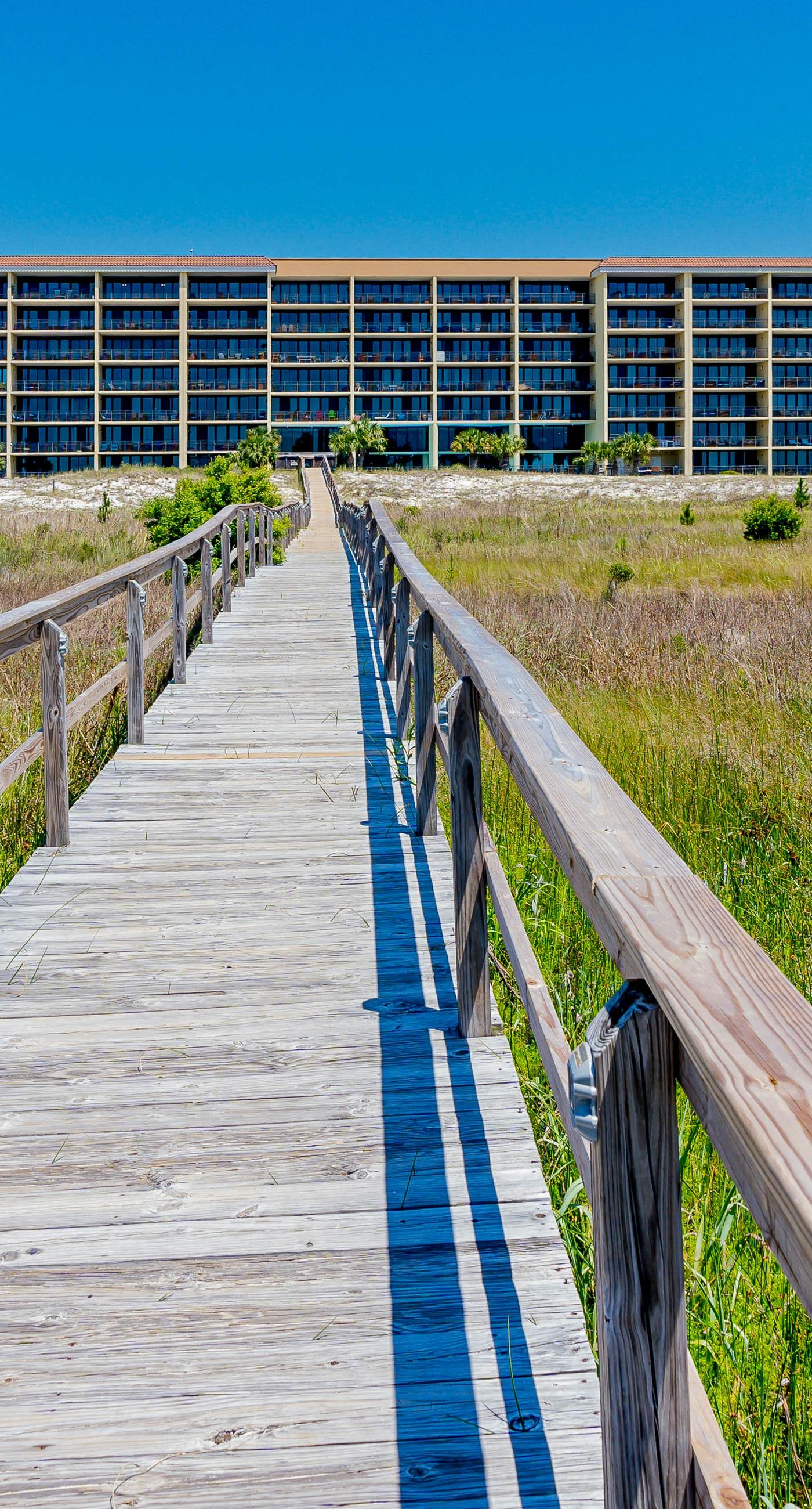 Sunlit beach condo with pool, hot tub, & amazing view - steps to the sand