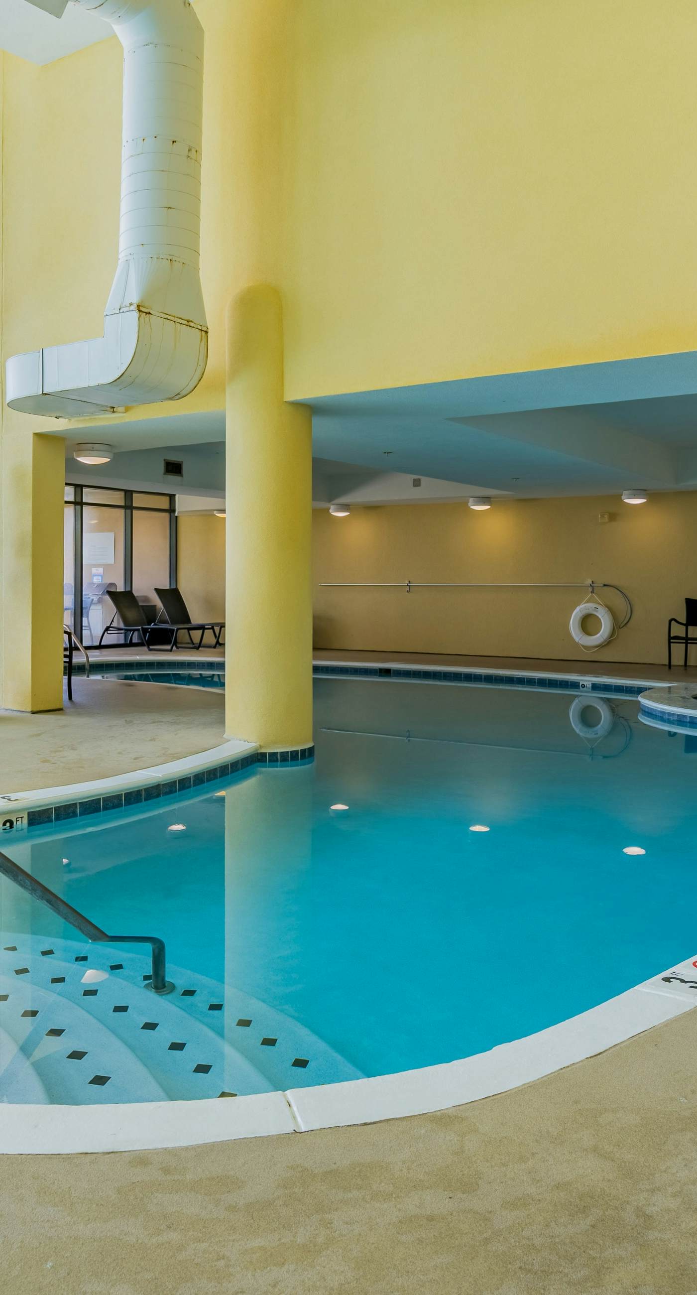 Sunlit beach condo with pool, hot tub, & amazing view - steps to the sand