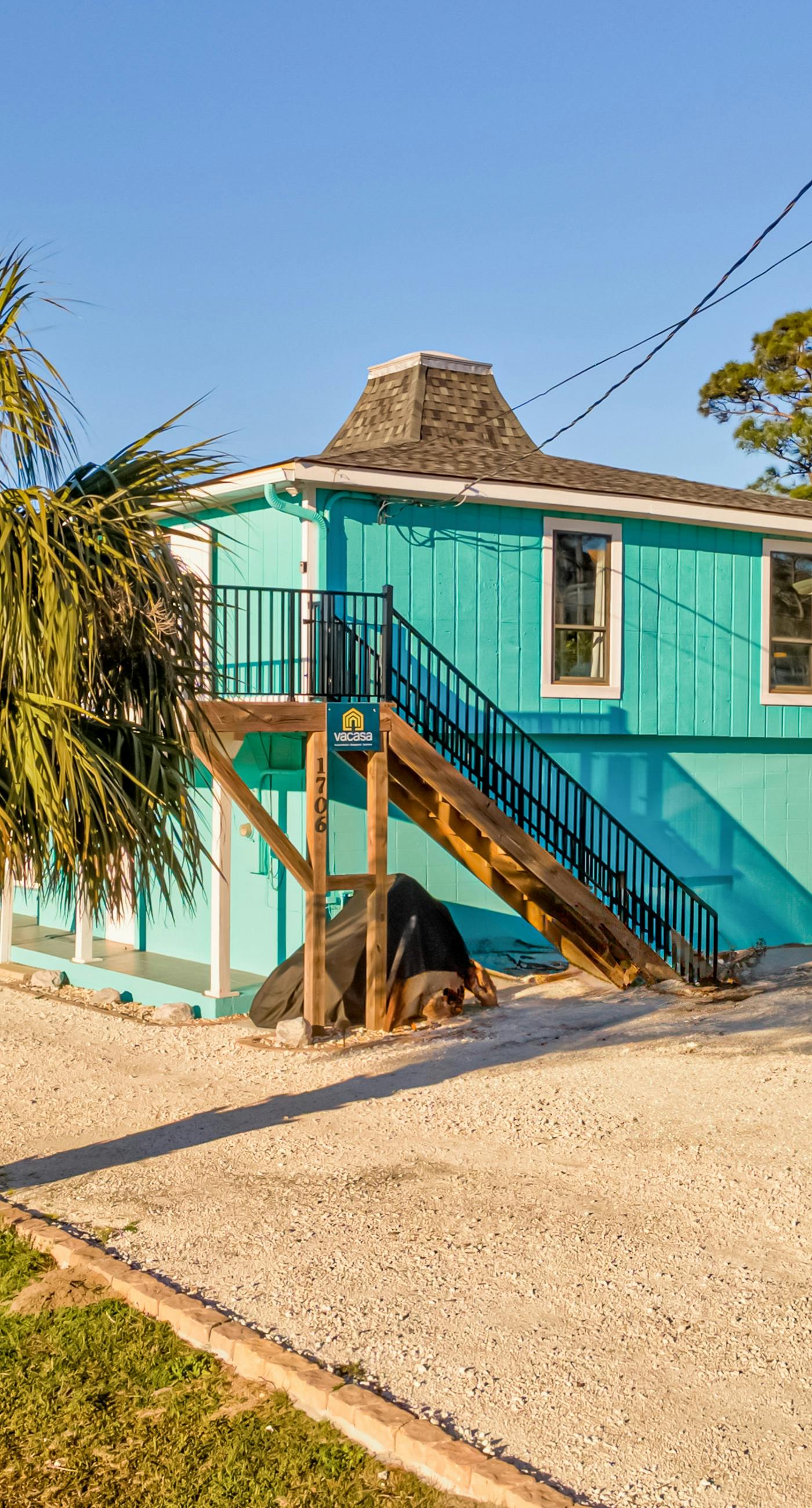 Dog-friendly bayfront duplex with private dock, 2 boat slips, kayaks, bay views