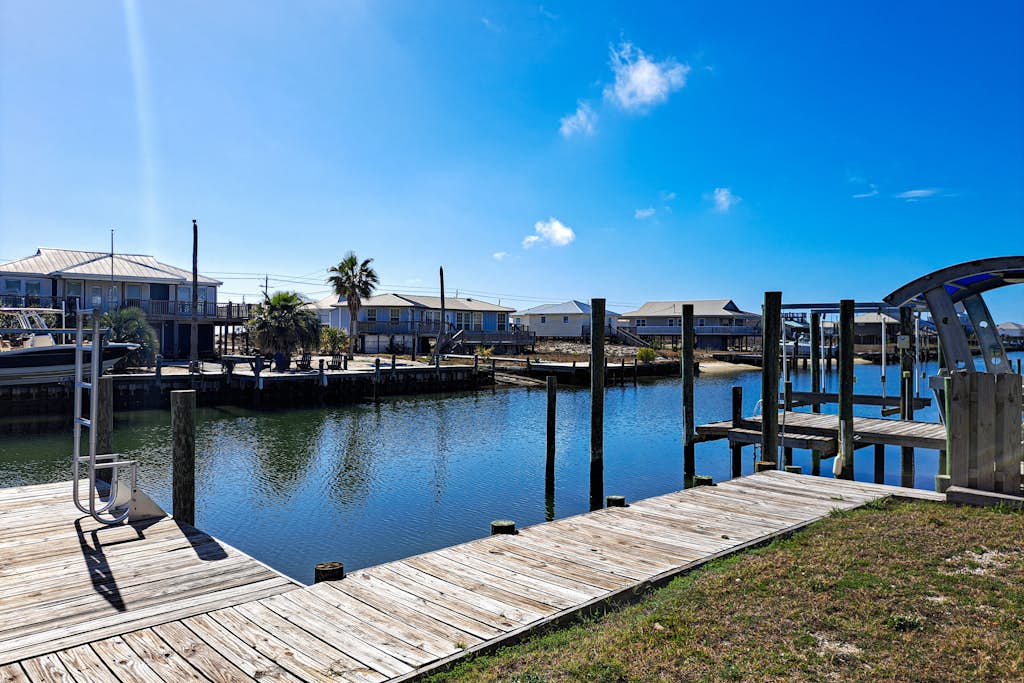Waterfront home with private grill, dock, and washer & dryer