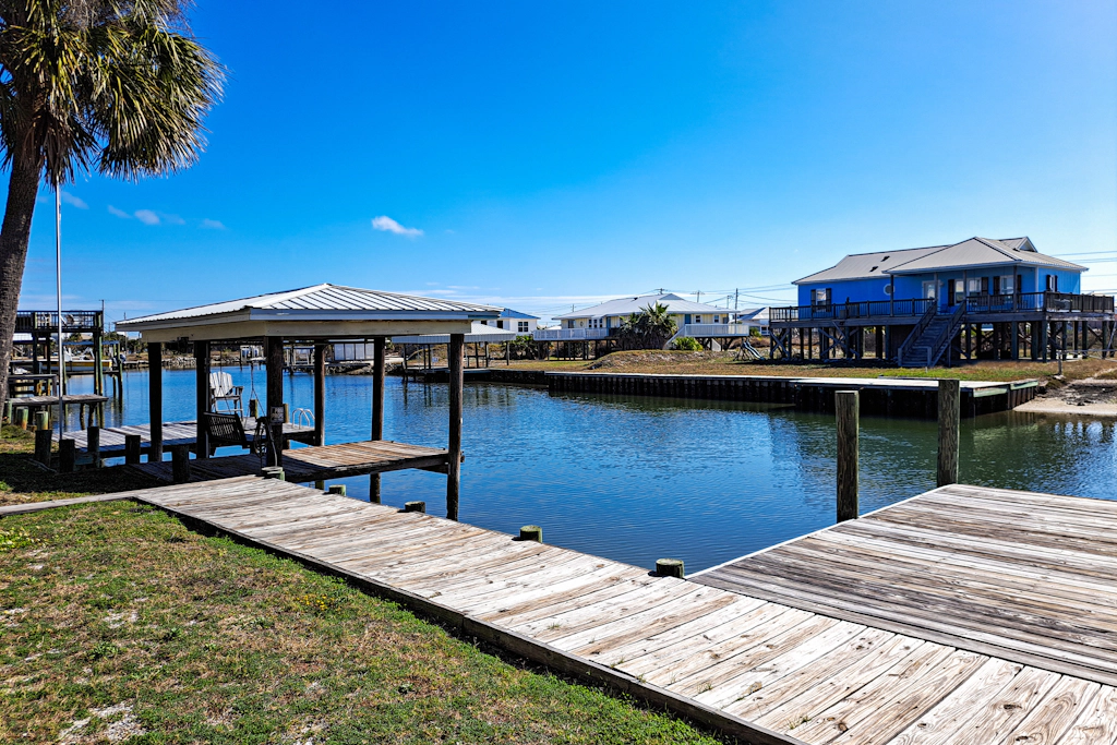 Waterfront home with private grill, dock, and washer & dryer