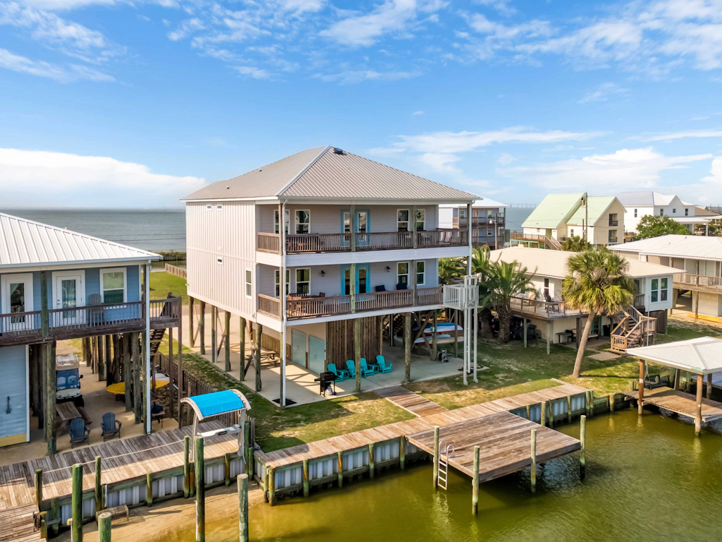 Waterfront home with private grill, dock, and washer & dryer