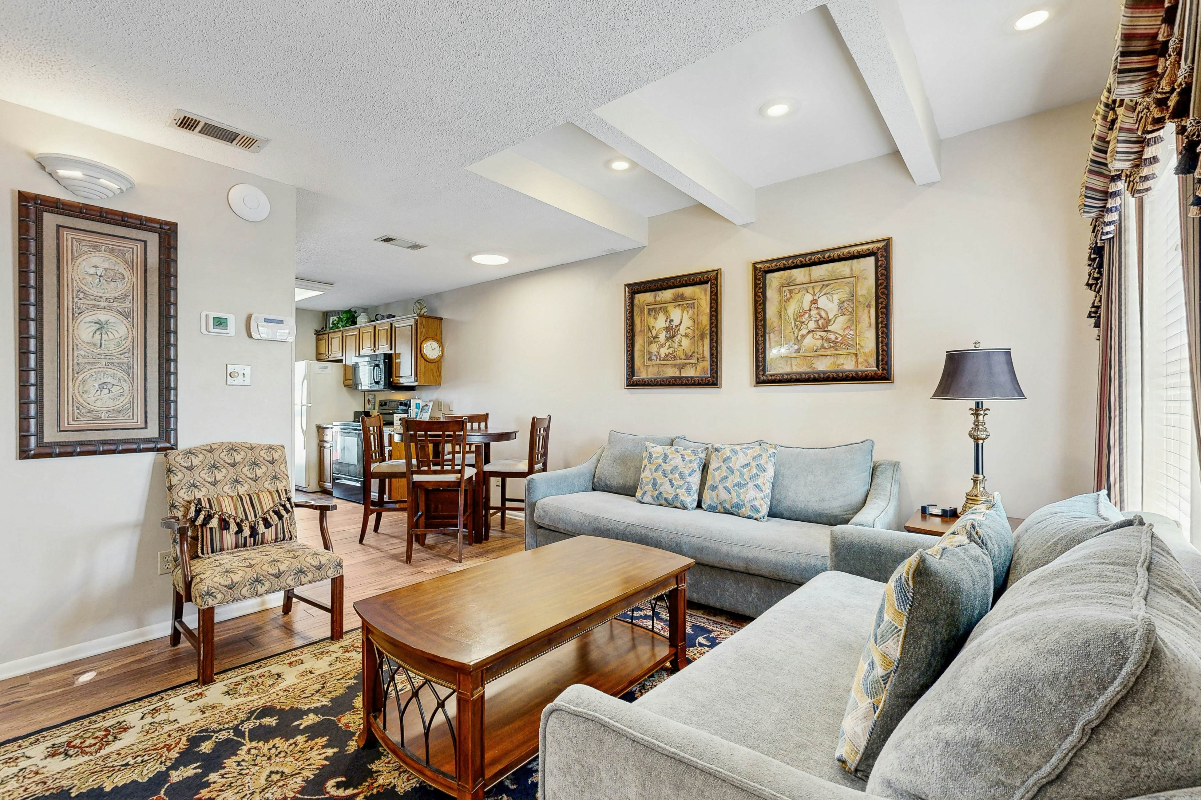 First floor condo with shared pool, close to the beach, and washer & dryer