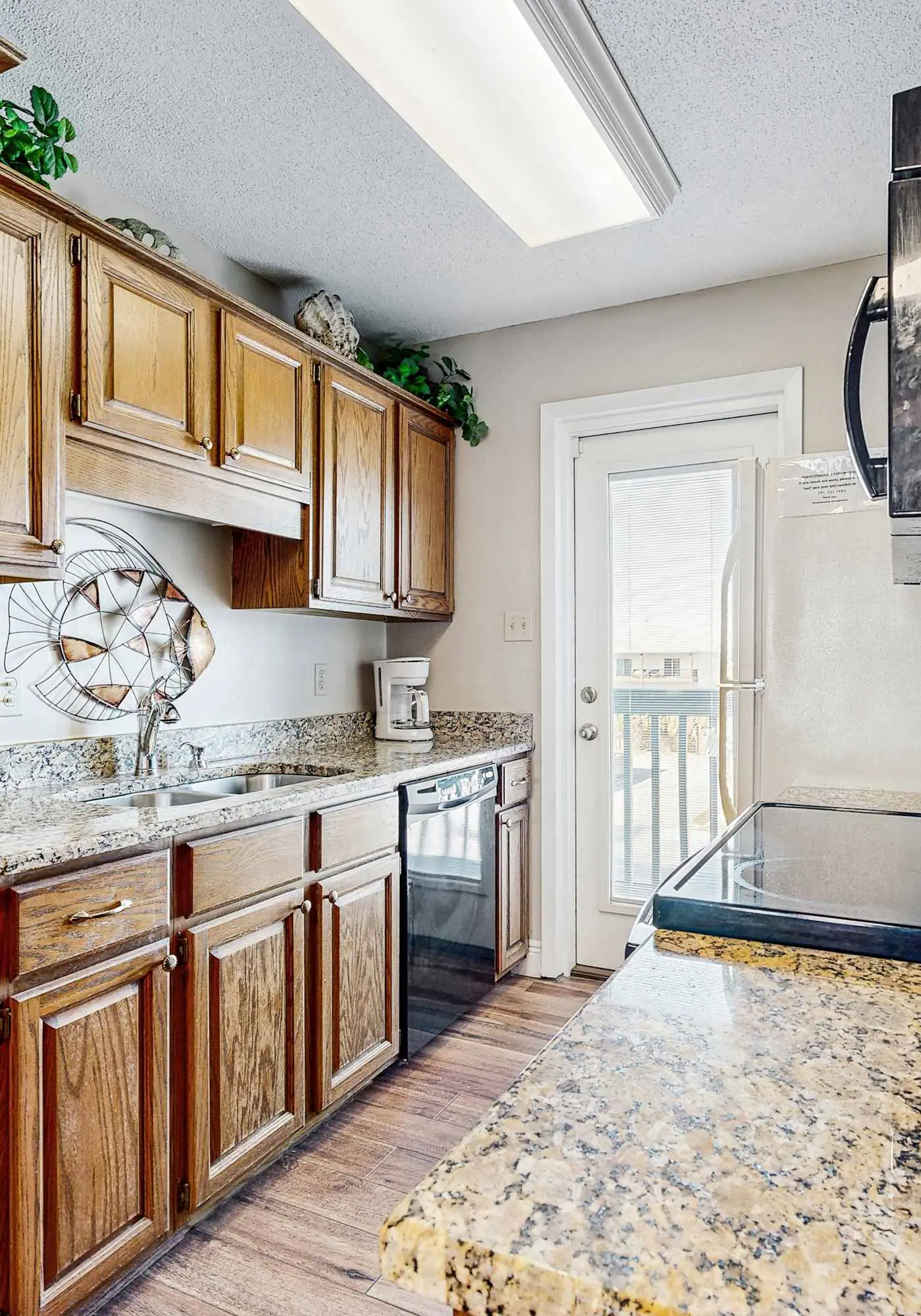 First floor condo with shared pool, close to the beach, and washer & dryer