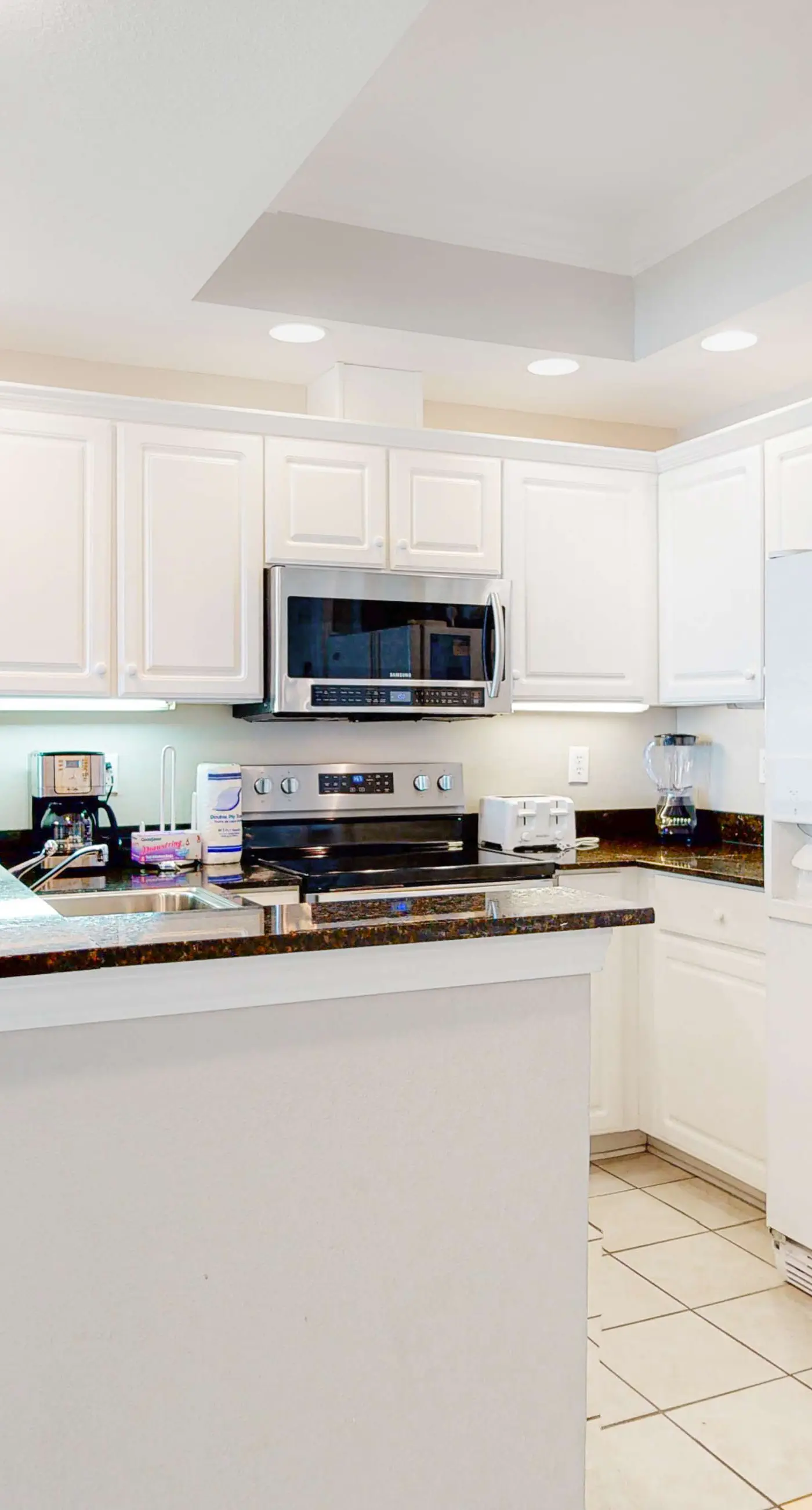 Waterfront beach home with deck, balcony, central AC, & washer dryer