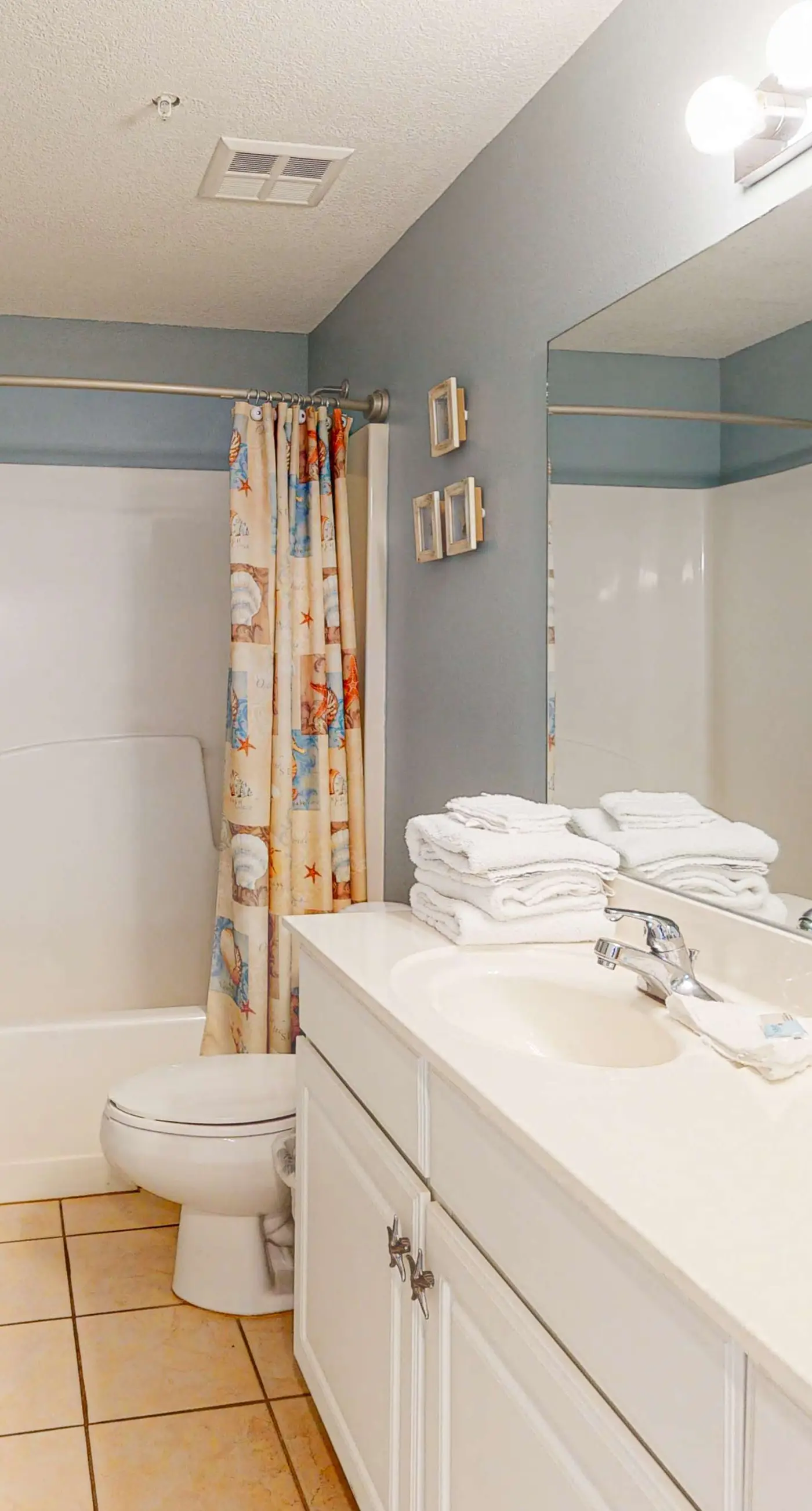 Waterfront beach home with deck, balcony, central AC, & washer dryer