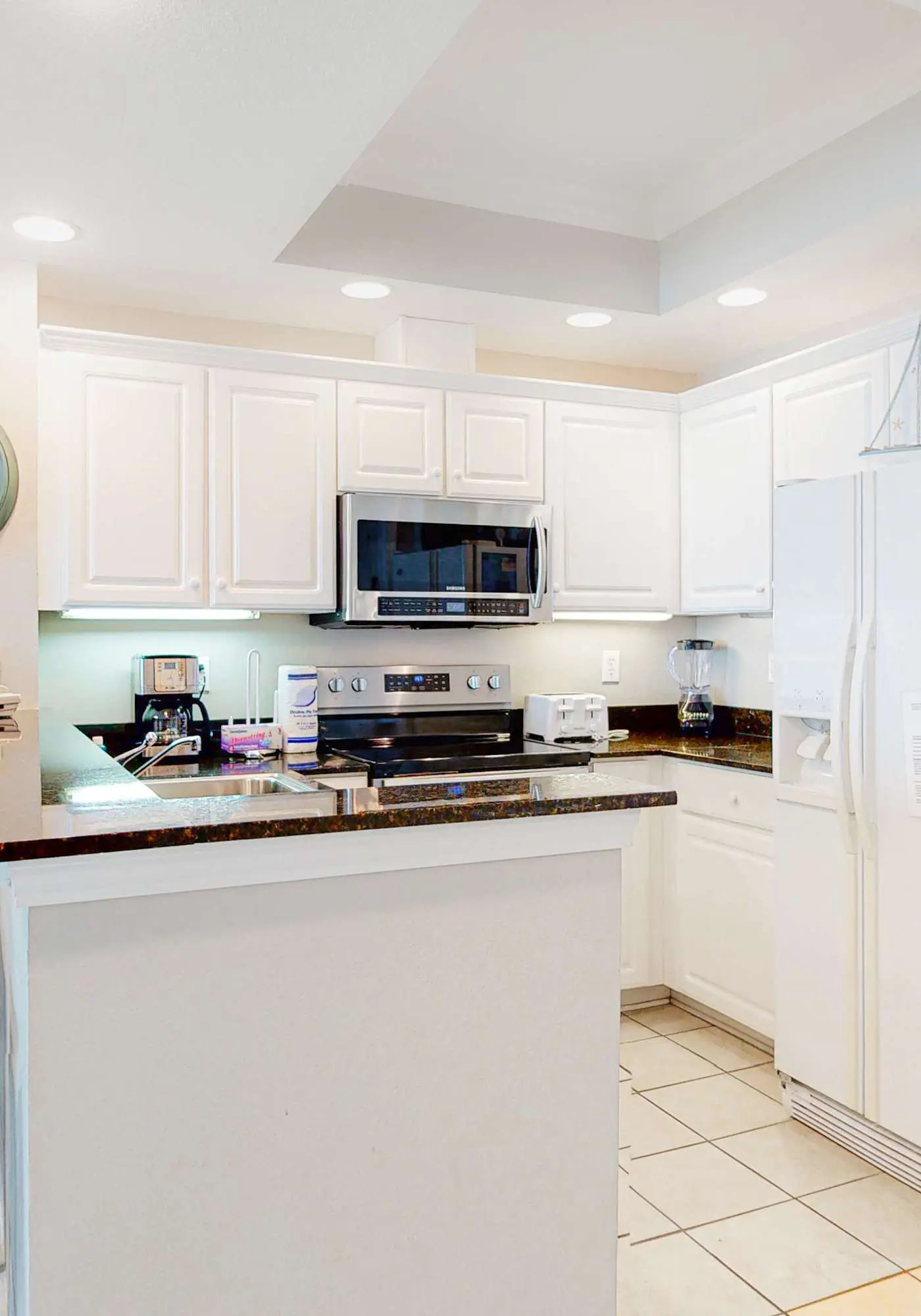 Waterfront beach home with deck, balcony, central AC, & washer dryer