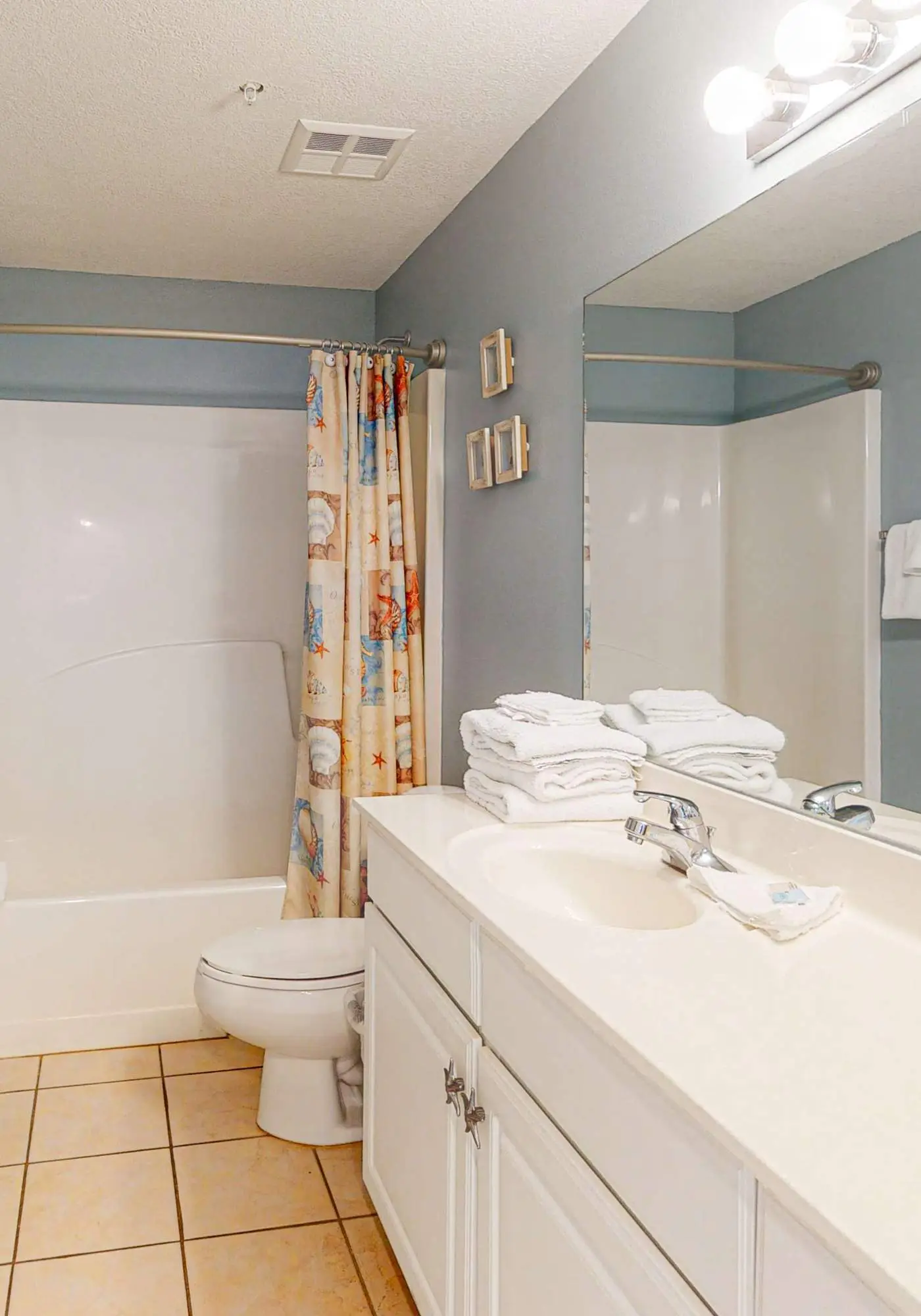 Waterfront beach home with deck, balcony, central AC, & washer dryer