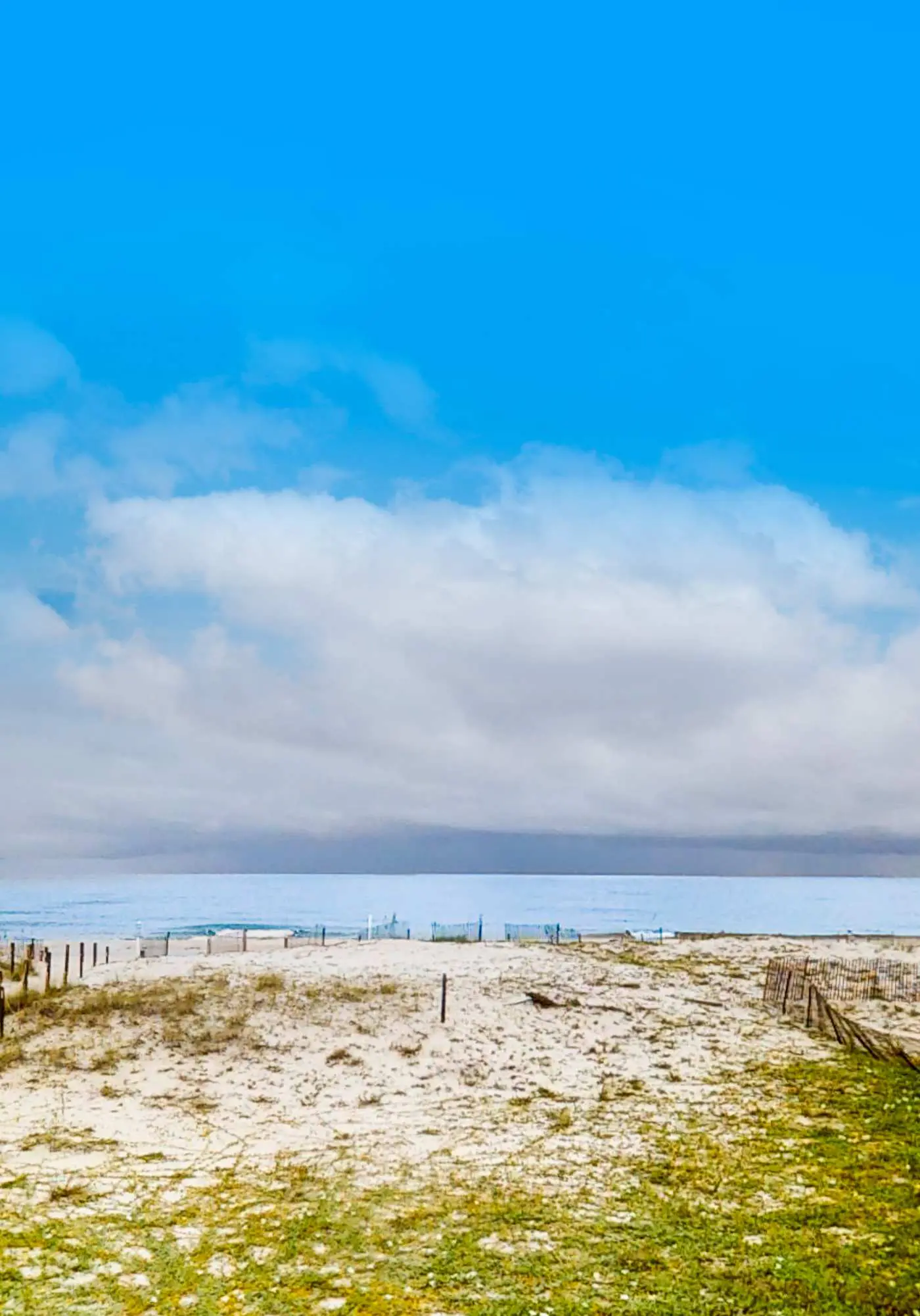3rd-floor beachfront condo with private balcony, AC, hot tub, pool, sauna