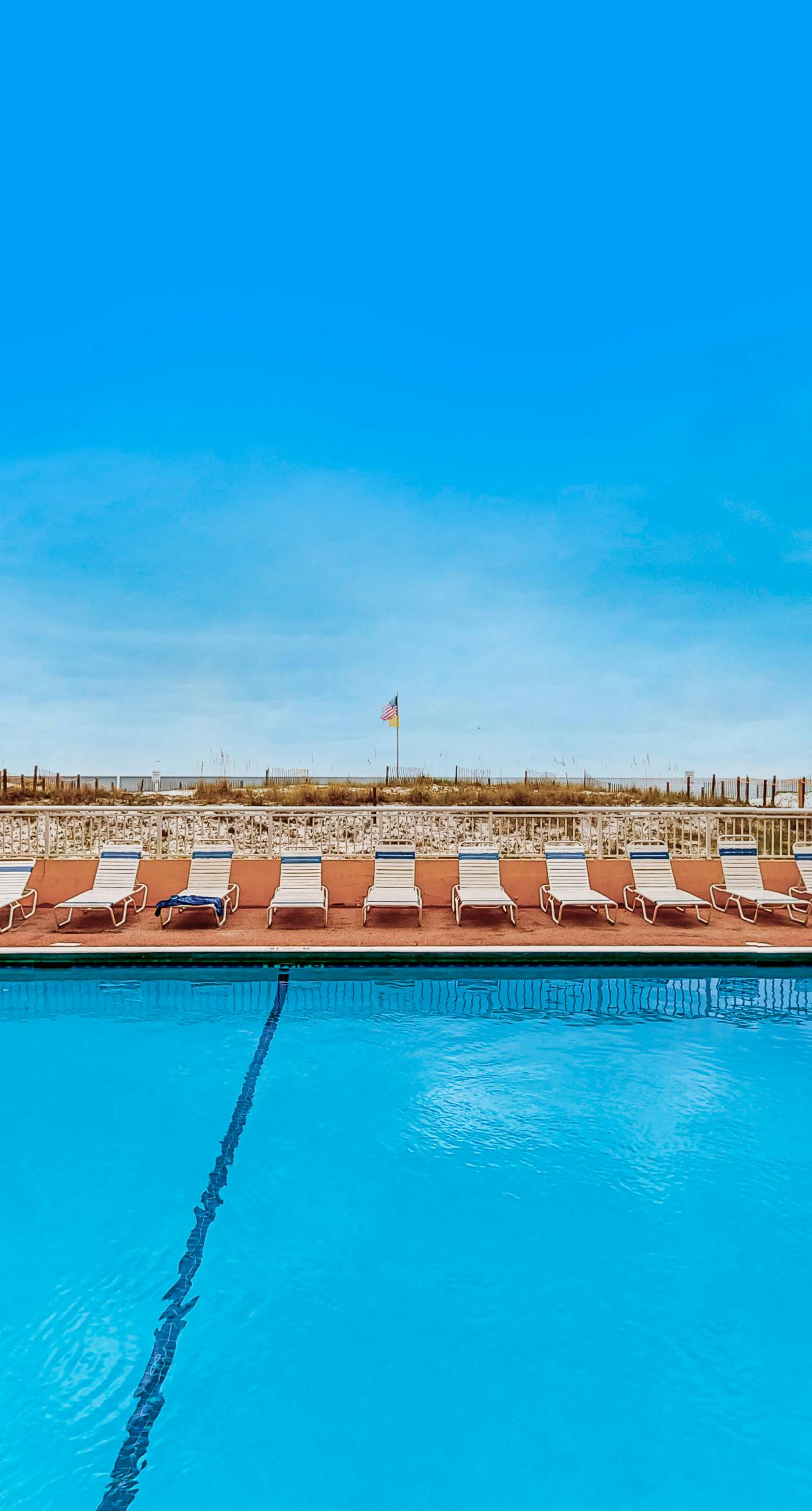 Beachfront Condo with Shared Outdoor Pool, Central AC, Private Balcony, Views, WiFi