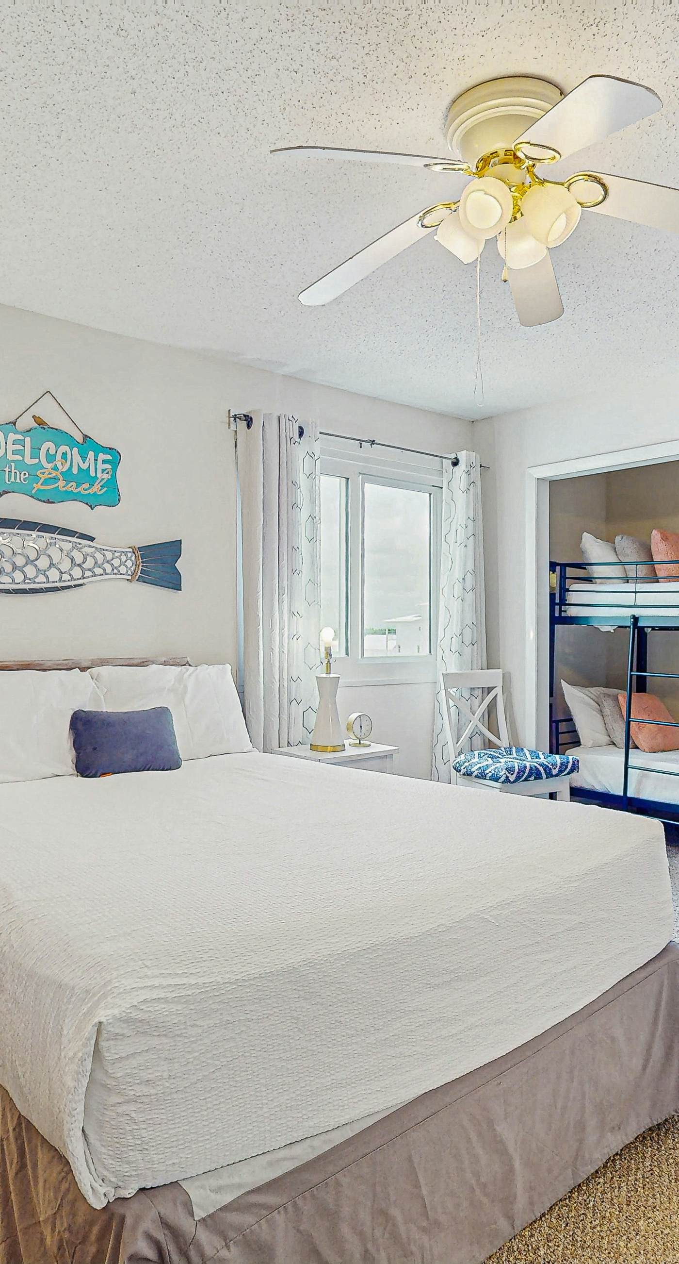 Beachfront condo with enclosed balcony, pool, views, central AC, & grill