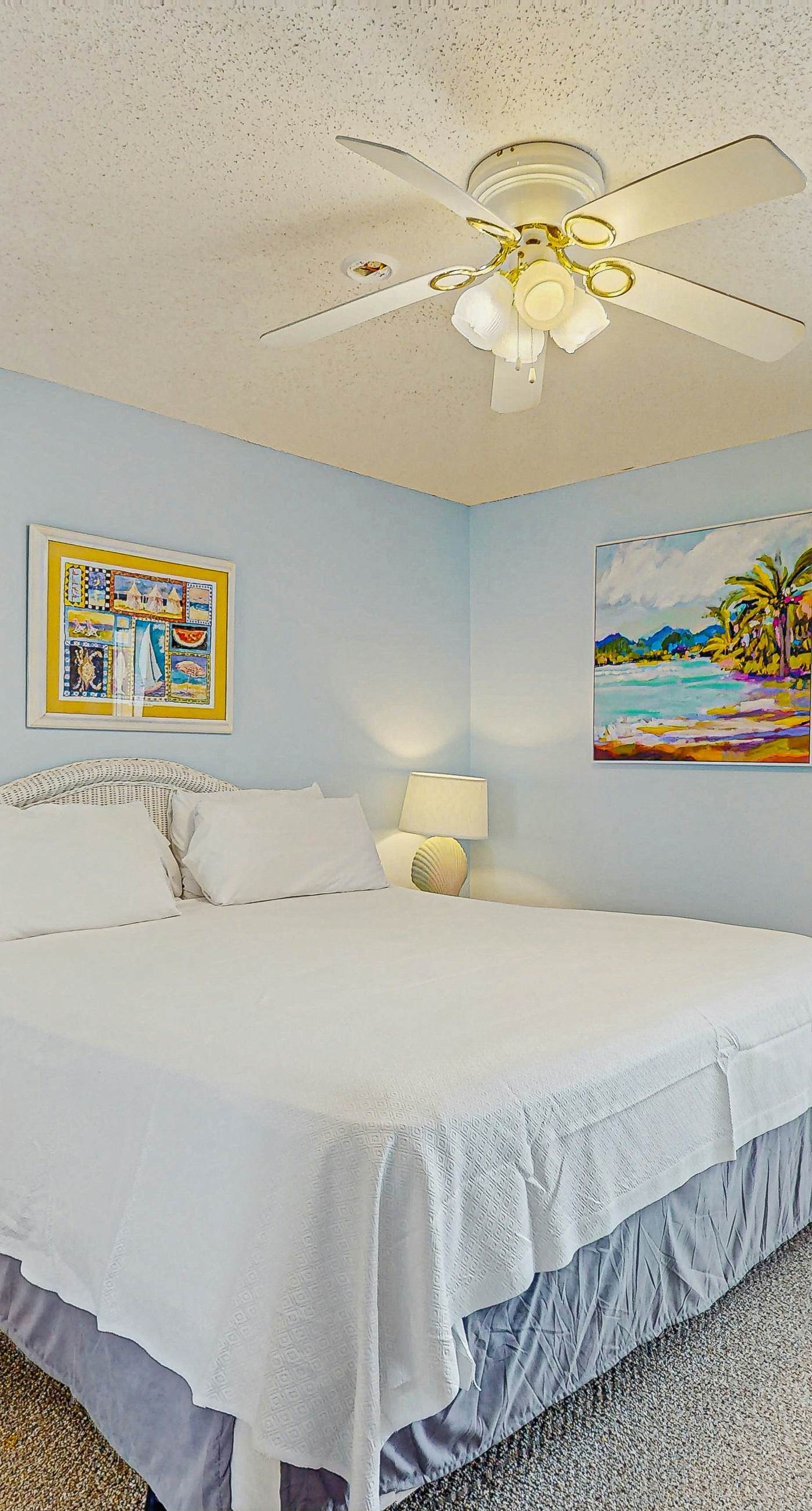 Beachfront condo with enclosed balcony, pool, views, central AC, & grill