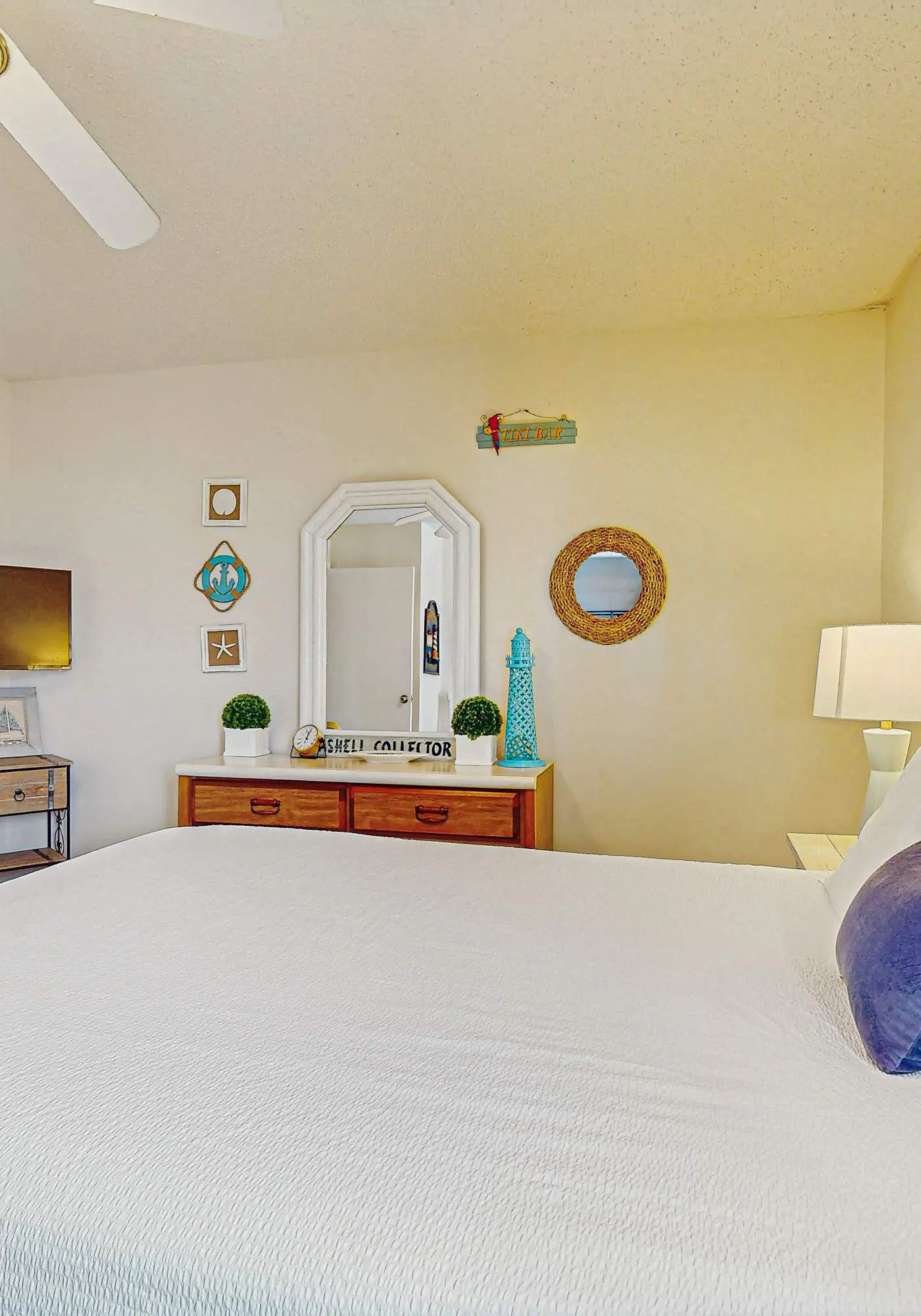 Beachfront condo with enclosed balcony, pool, views, central AC, & grill
