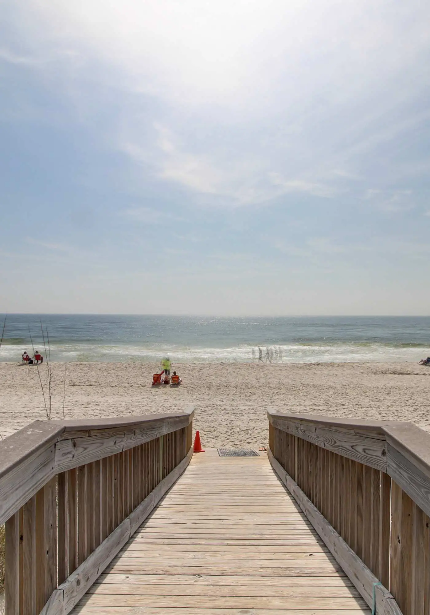 Beachfront condo with enclosed balcony, pool, views, central AC, & grill